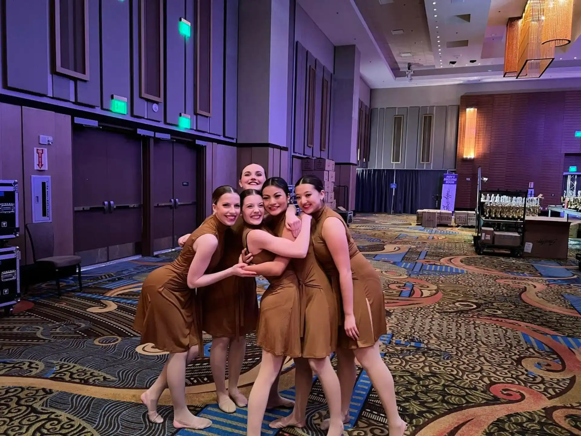 a group of people posing for the camera