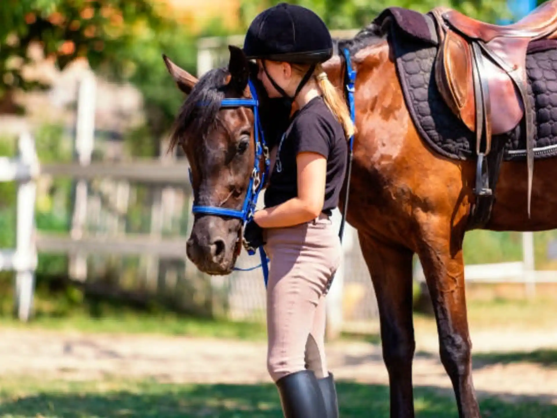 a person standing next to a horse