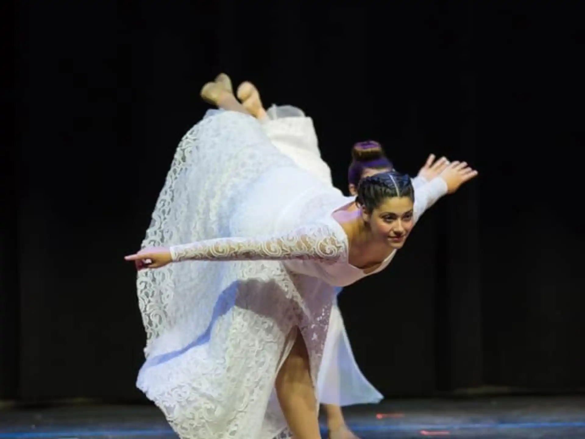 a person dancing on a stage