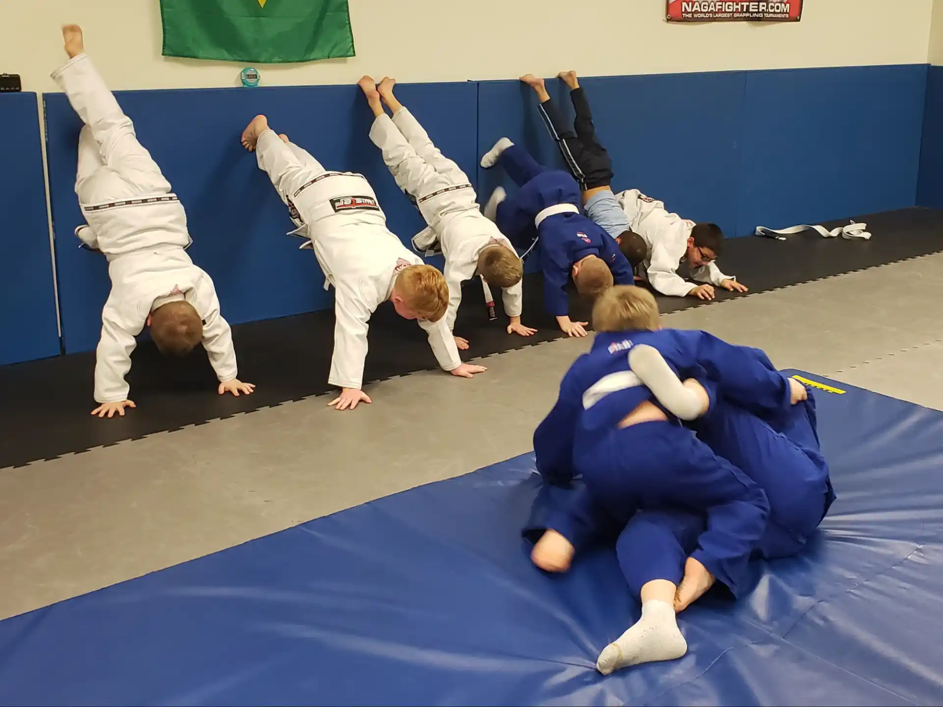 a group of people in karate uniforms