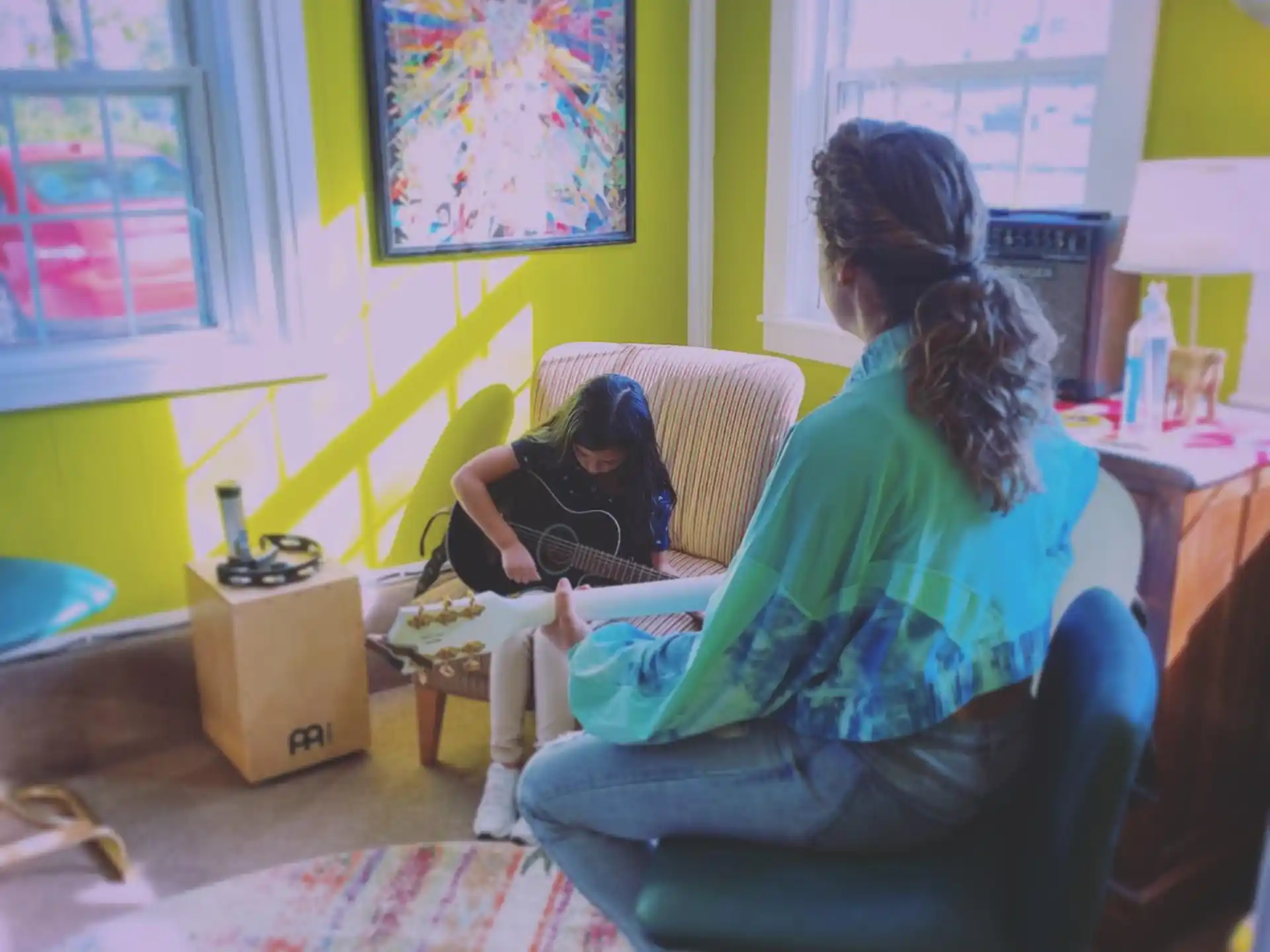 a group of people sitting in a room