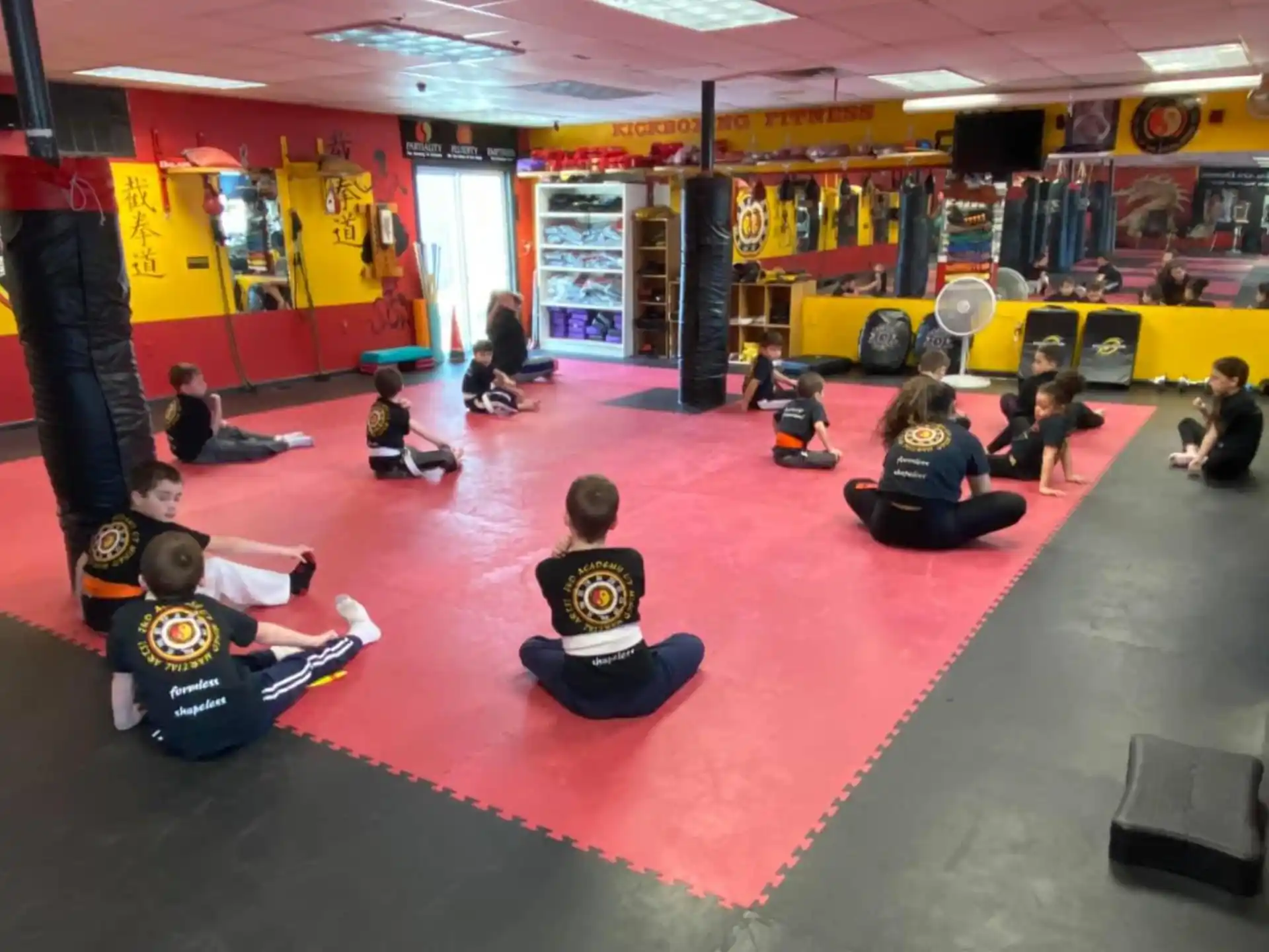 a group of people sitting on the floor