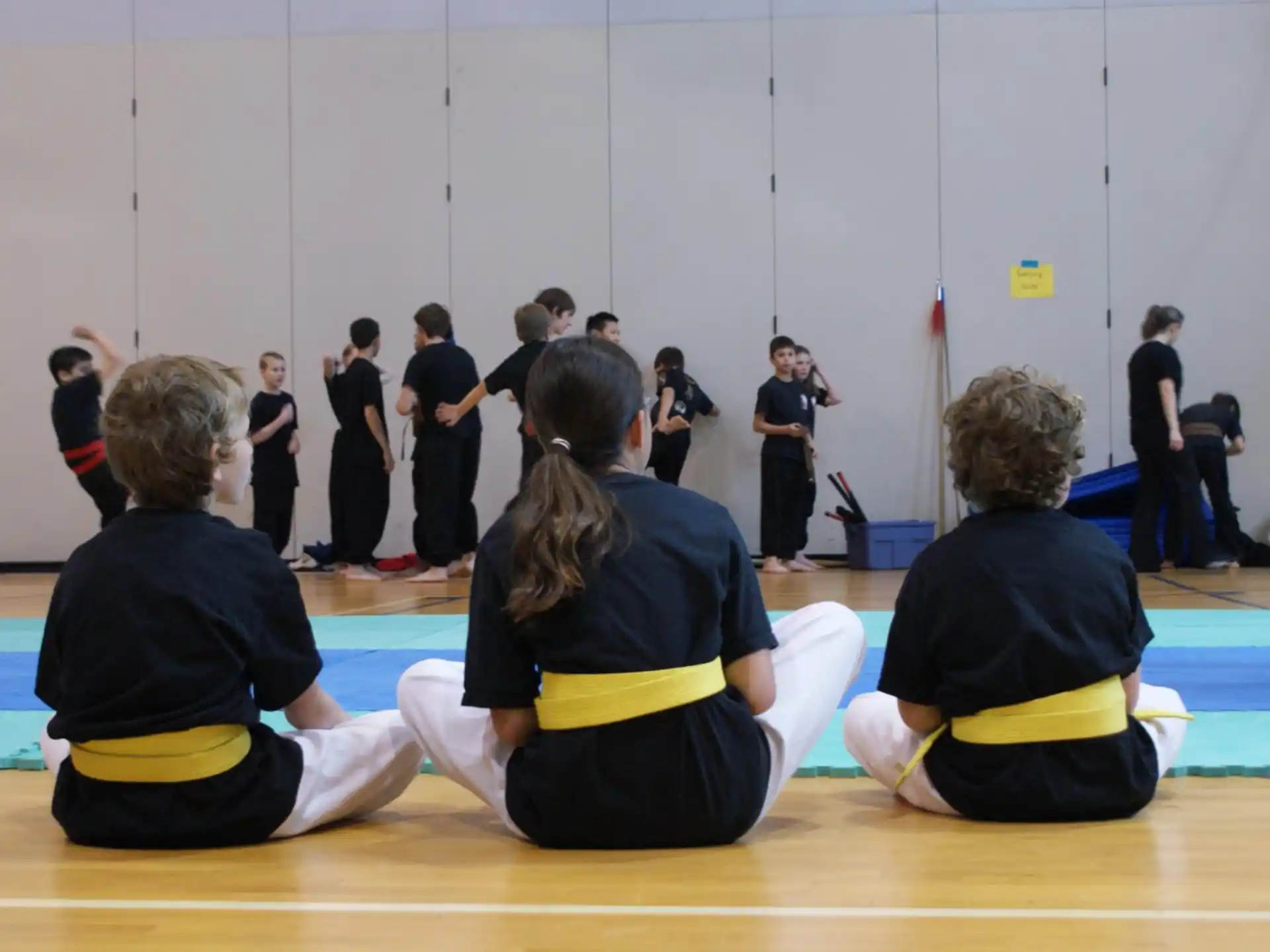 a group of people in a gym
