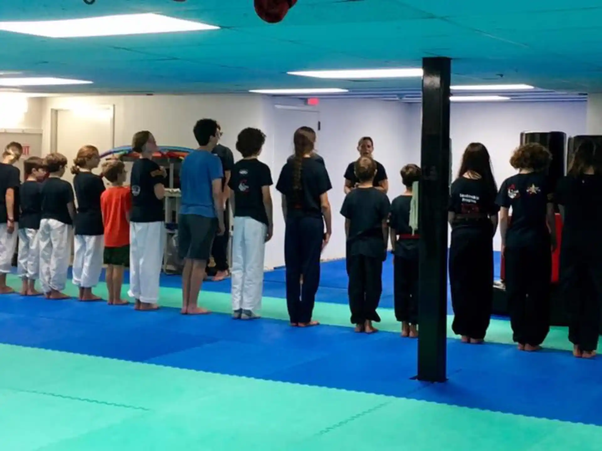 a group of people standing in a room