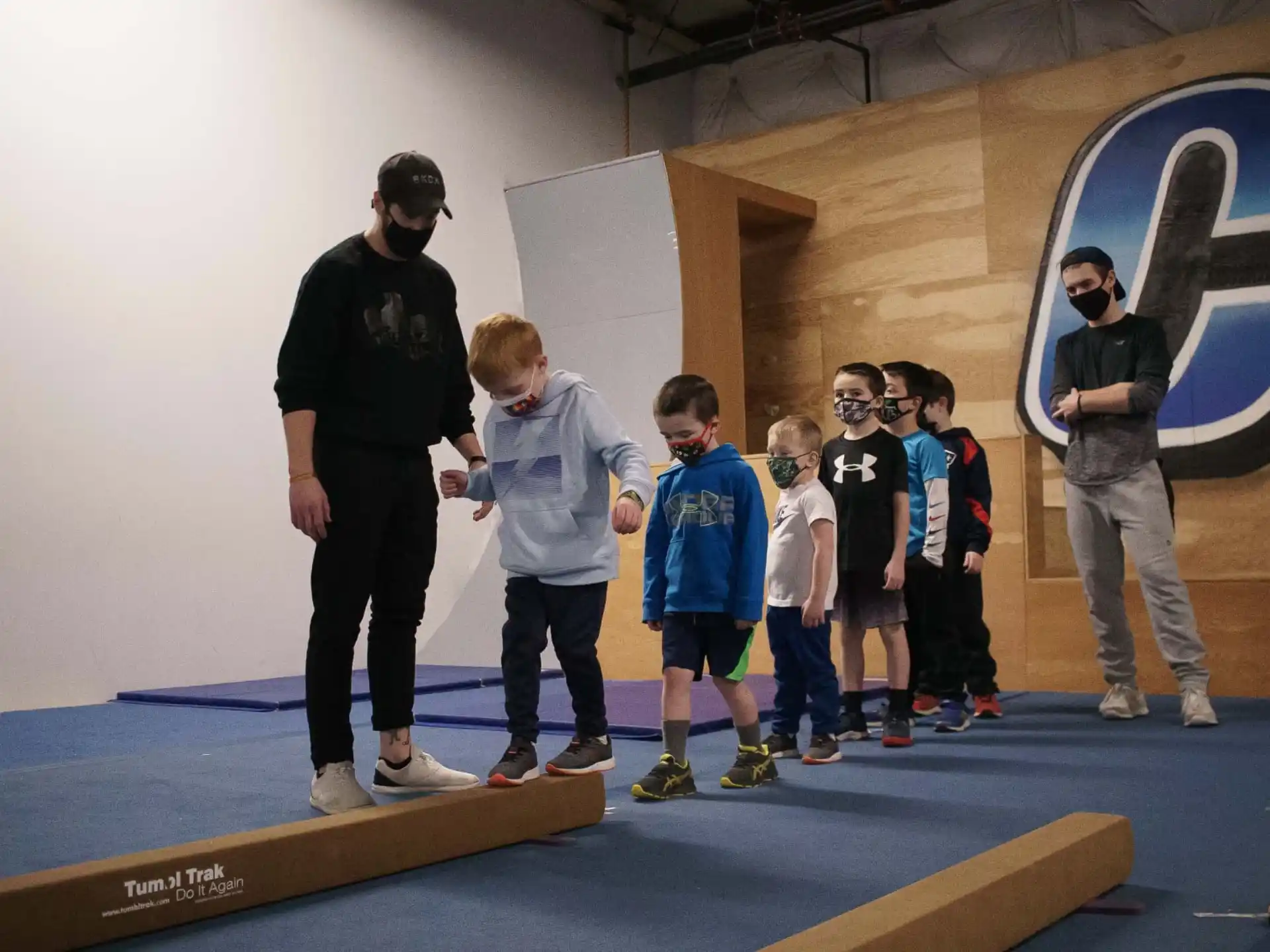 a group of kids standing on a stage