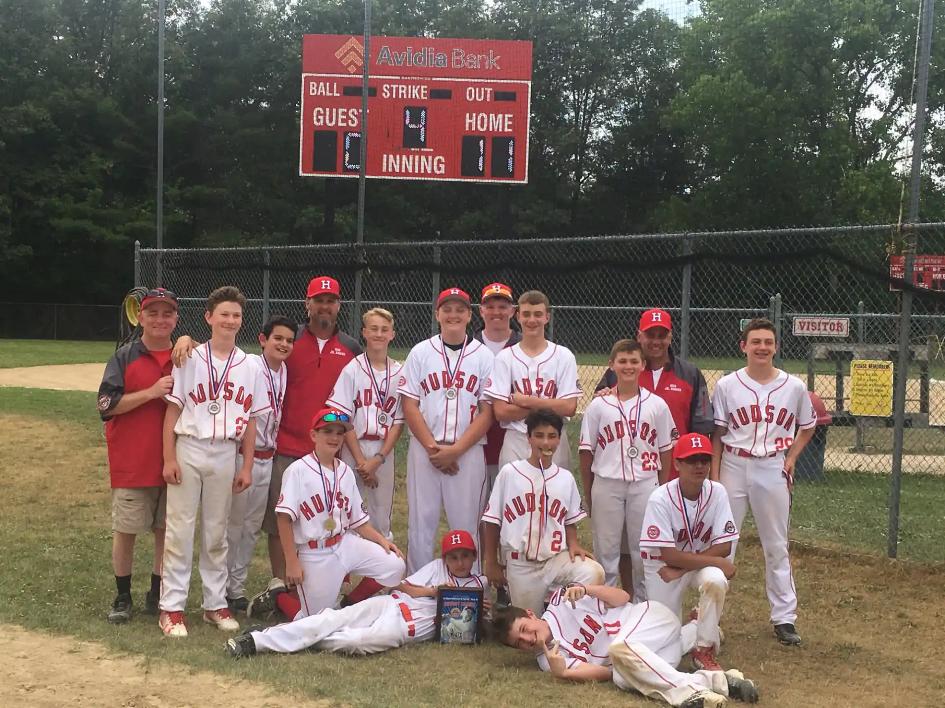 a group of baseball players posing for a photo