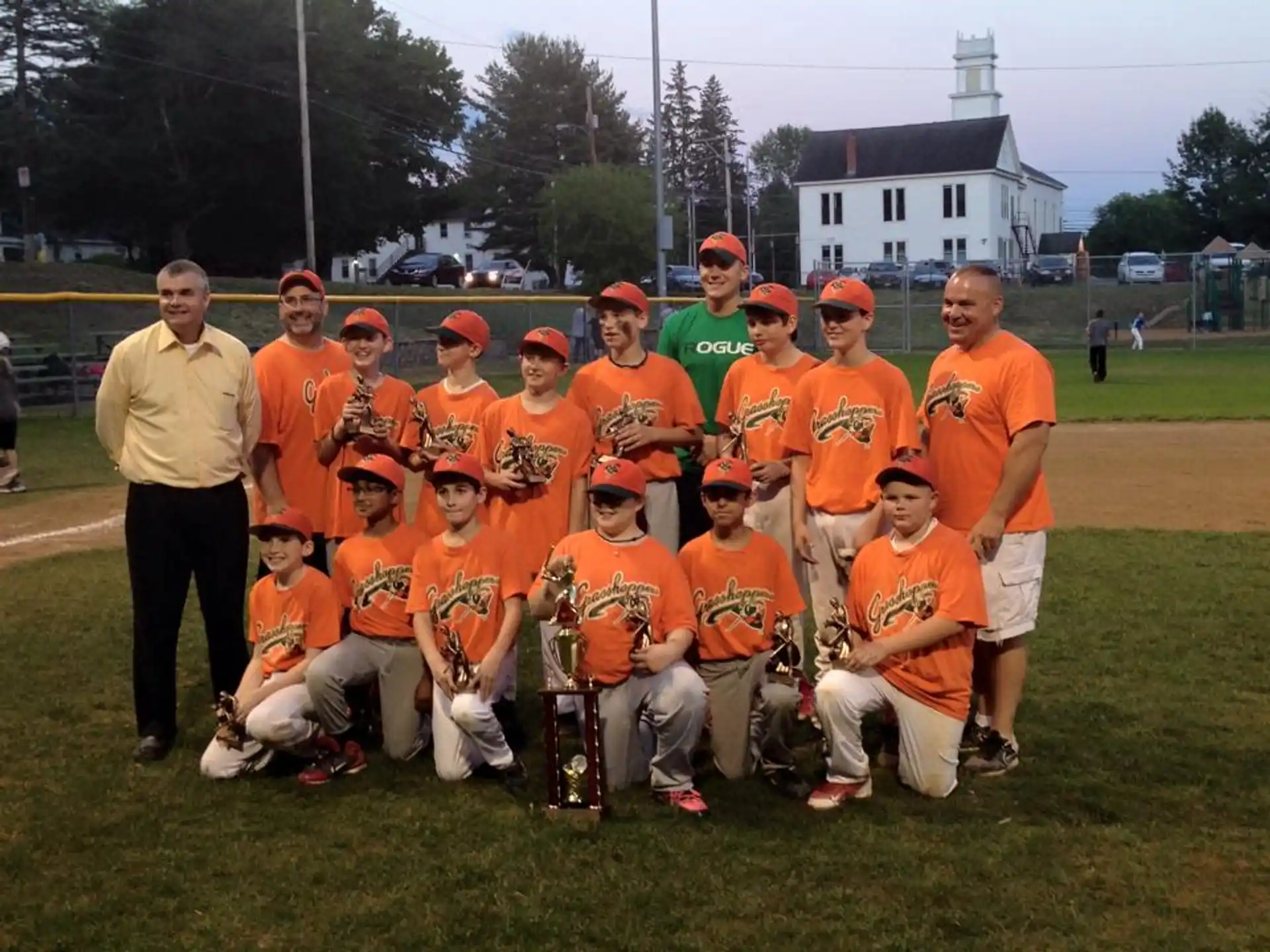 a group of baseball players posing for a photo