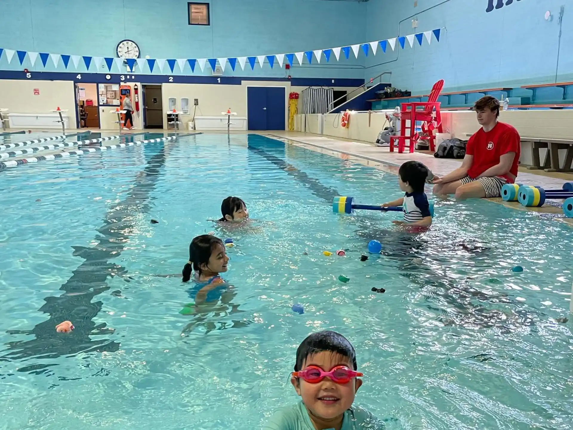 a group of people in a pool