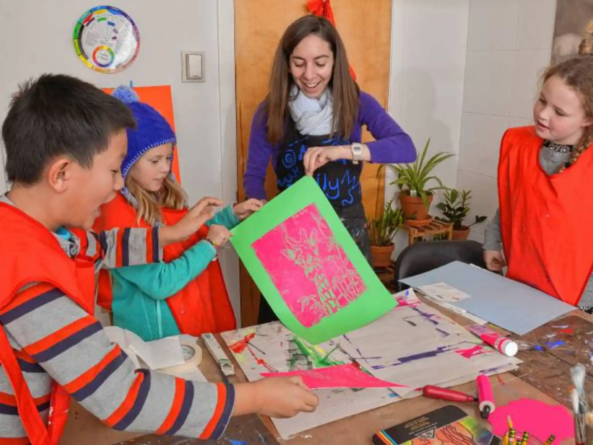 a group of people looking at a paper