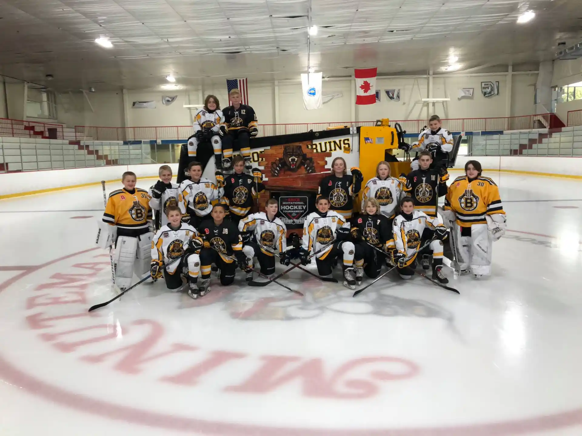 a hockey team posing for a photo