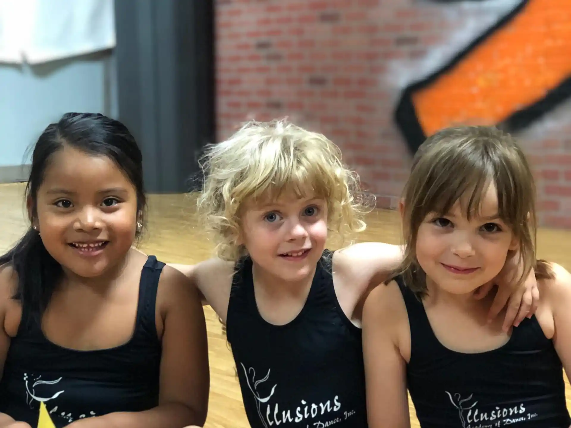 a group of girls posing for a picture