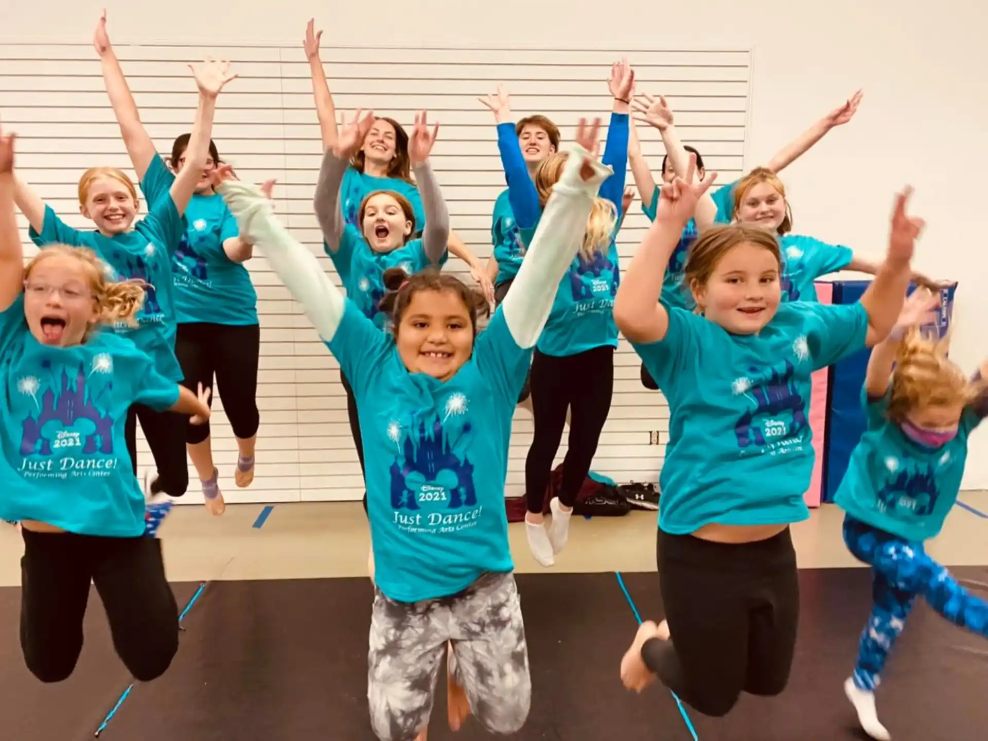 a group of children jumping