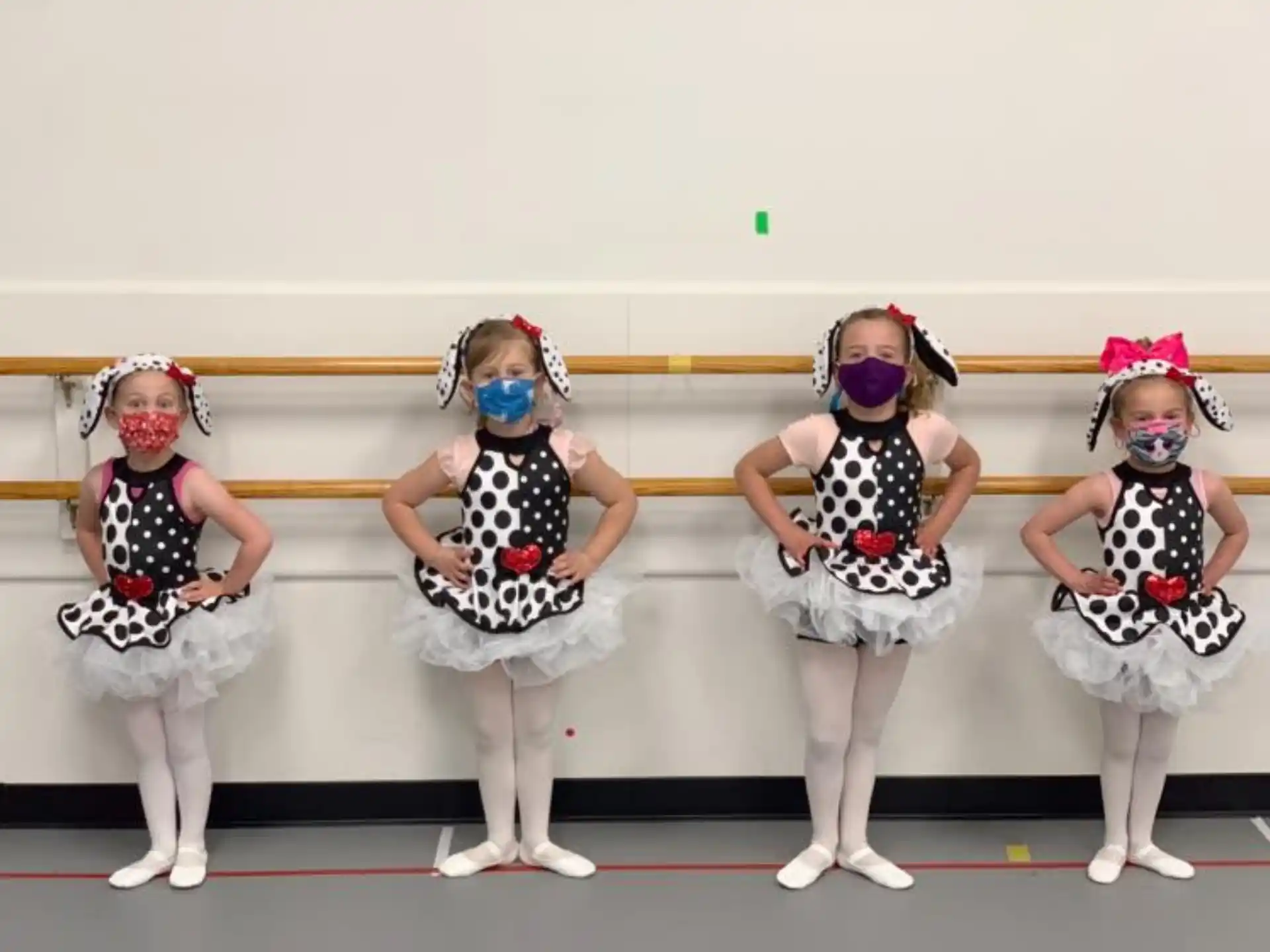 a group of girls wearing clothing