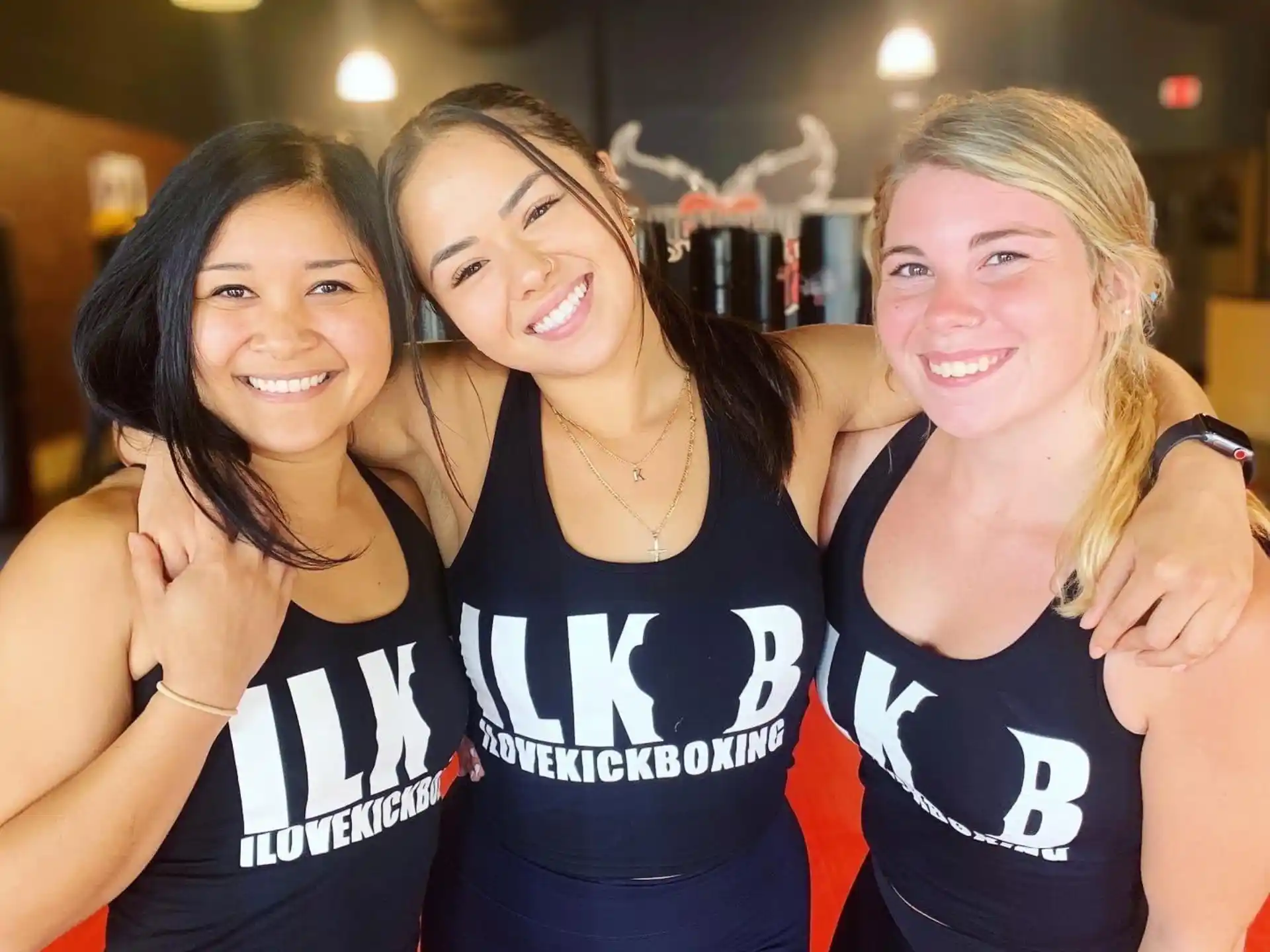 a group of women posing for a photo
