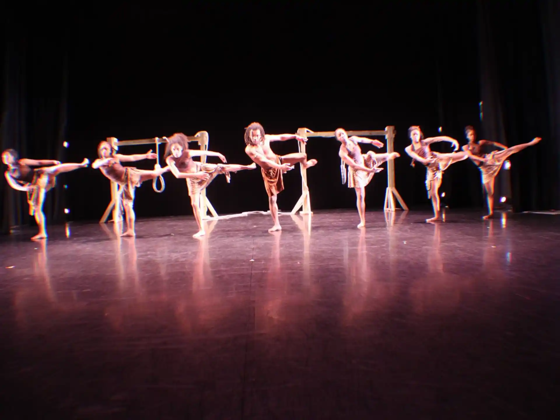 a group of dancers on a stage