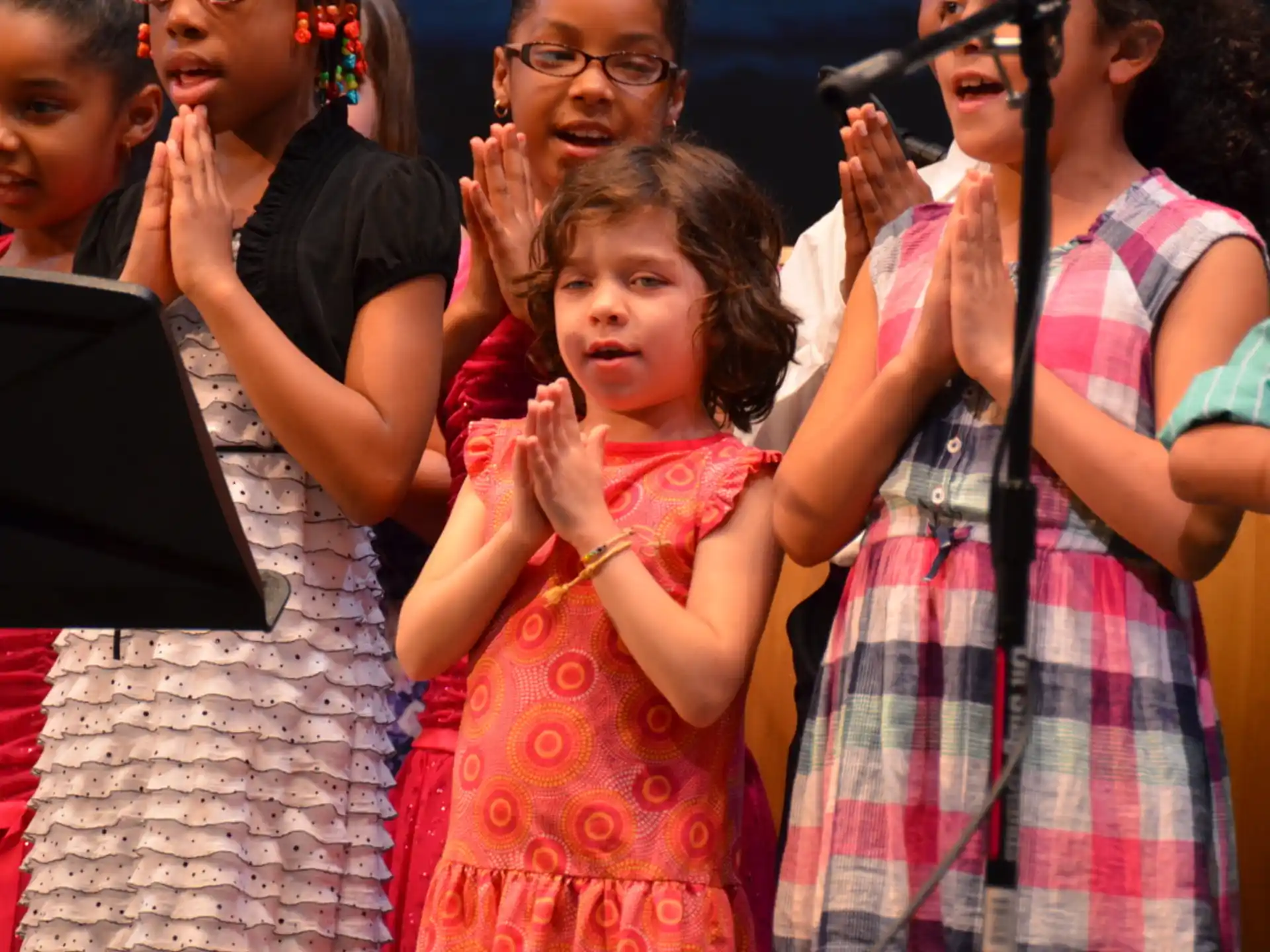 a group of people clapping