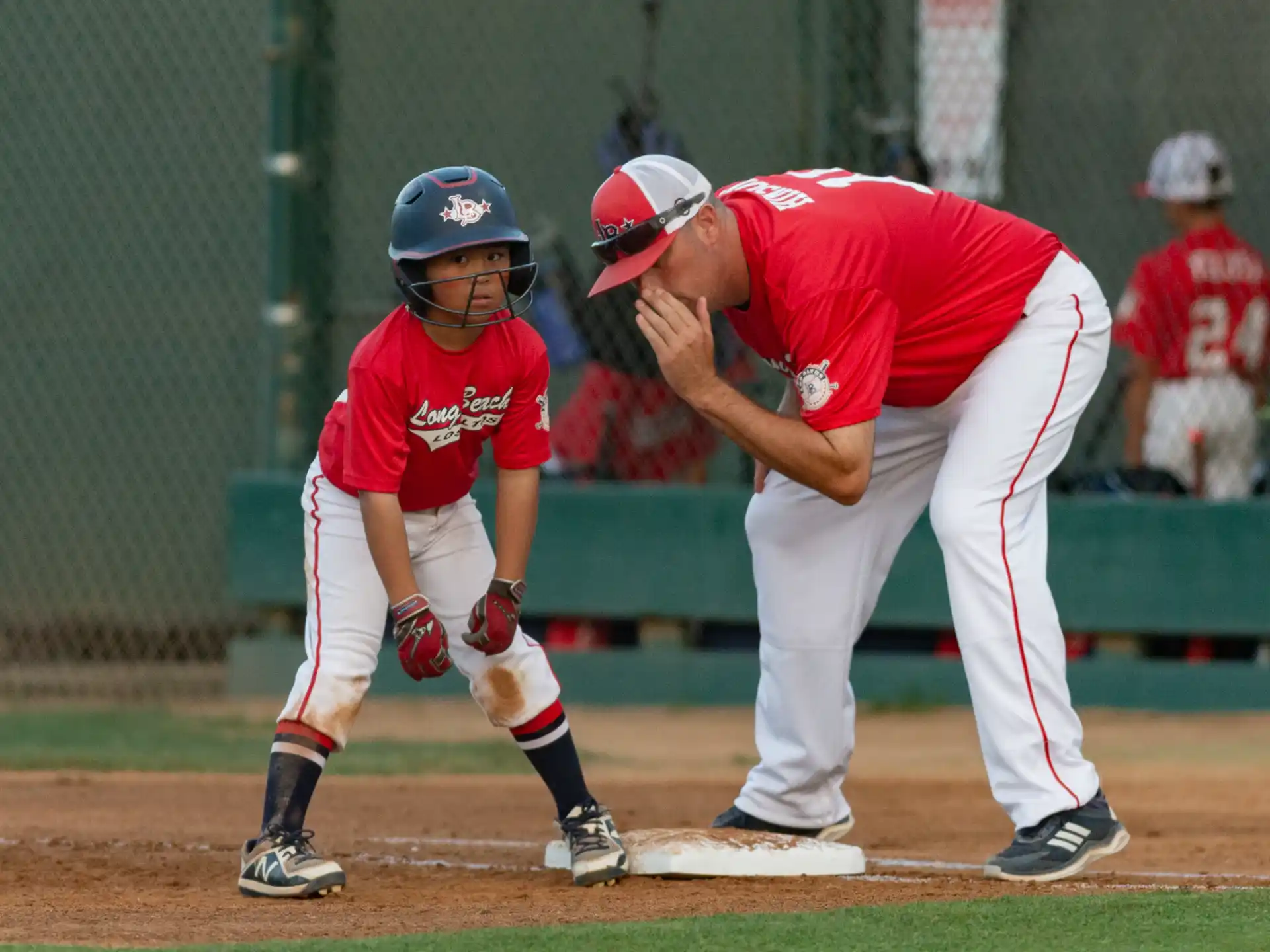 a baseball player is trying to hit a baseball