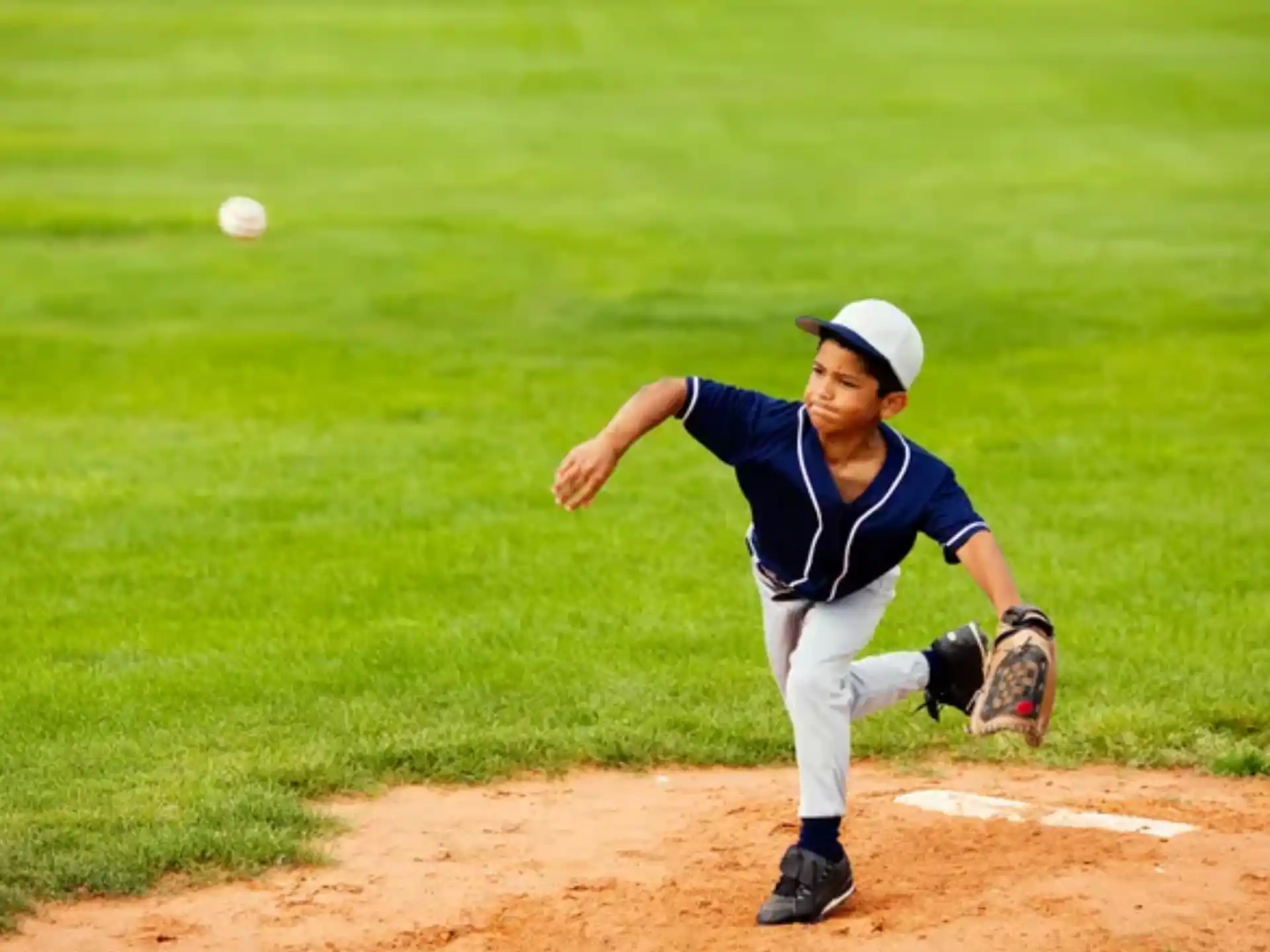 a baseball player throwing a ball