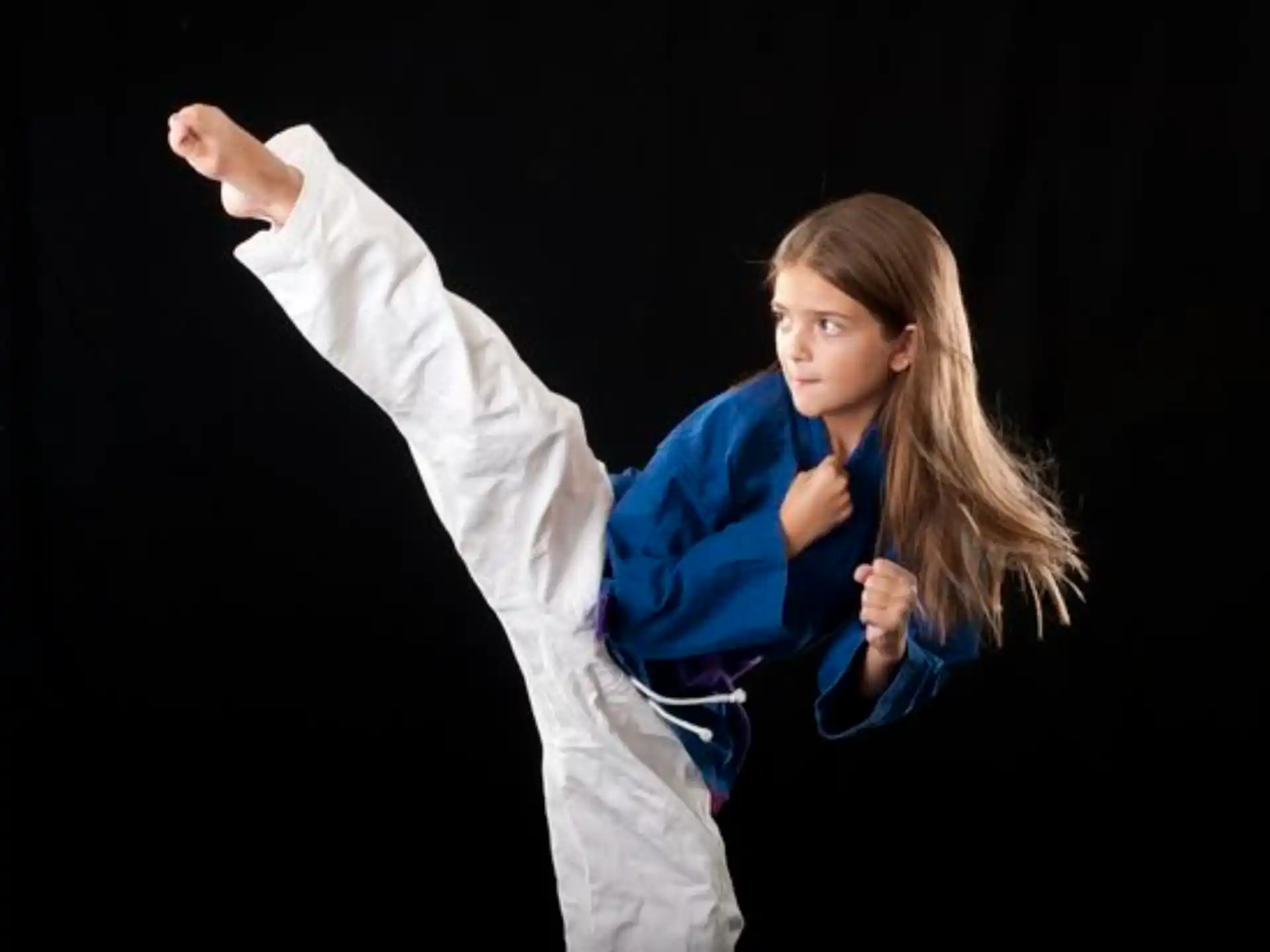 a person in a karate uniform