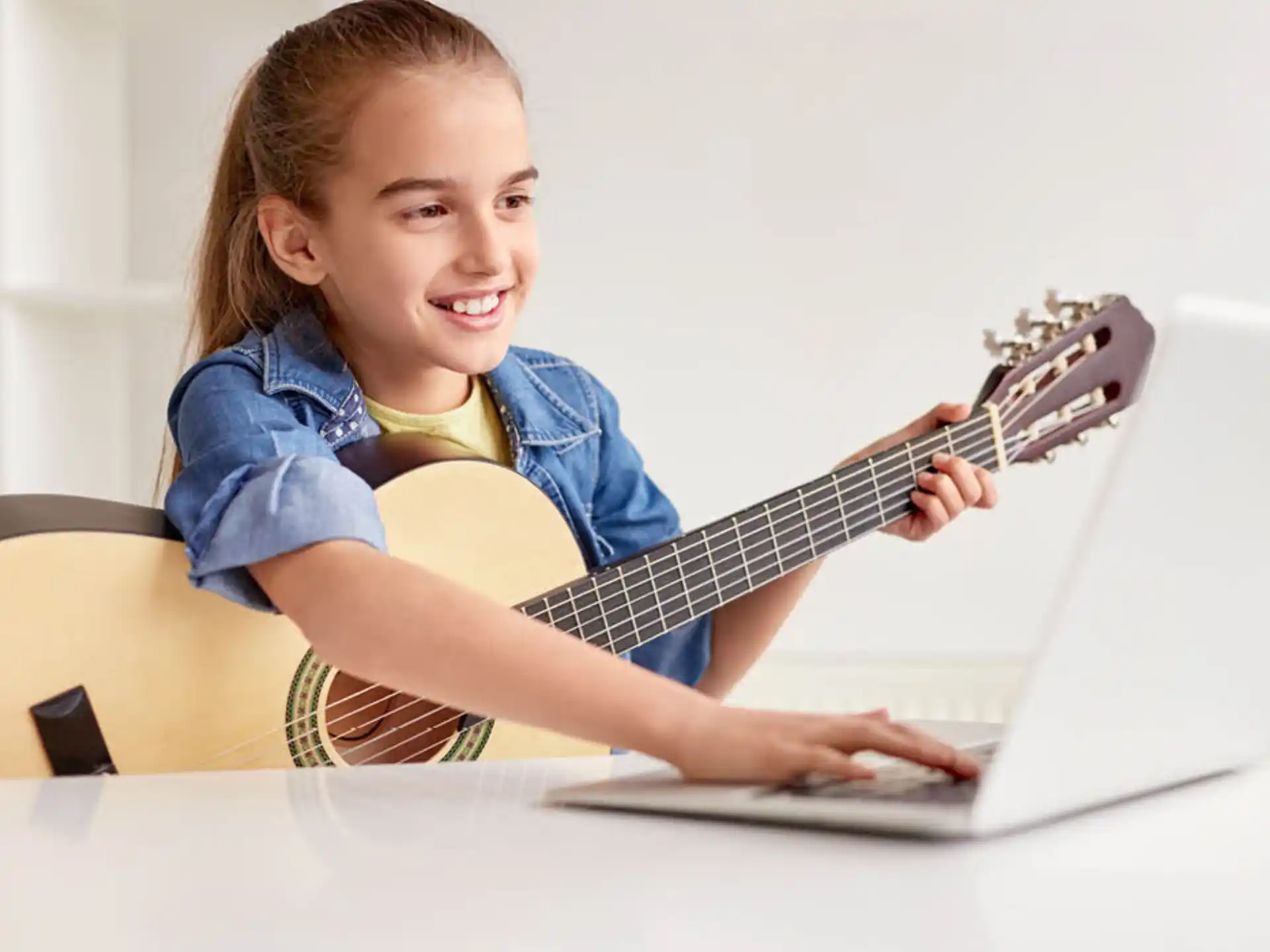 a girl playing a guitar