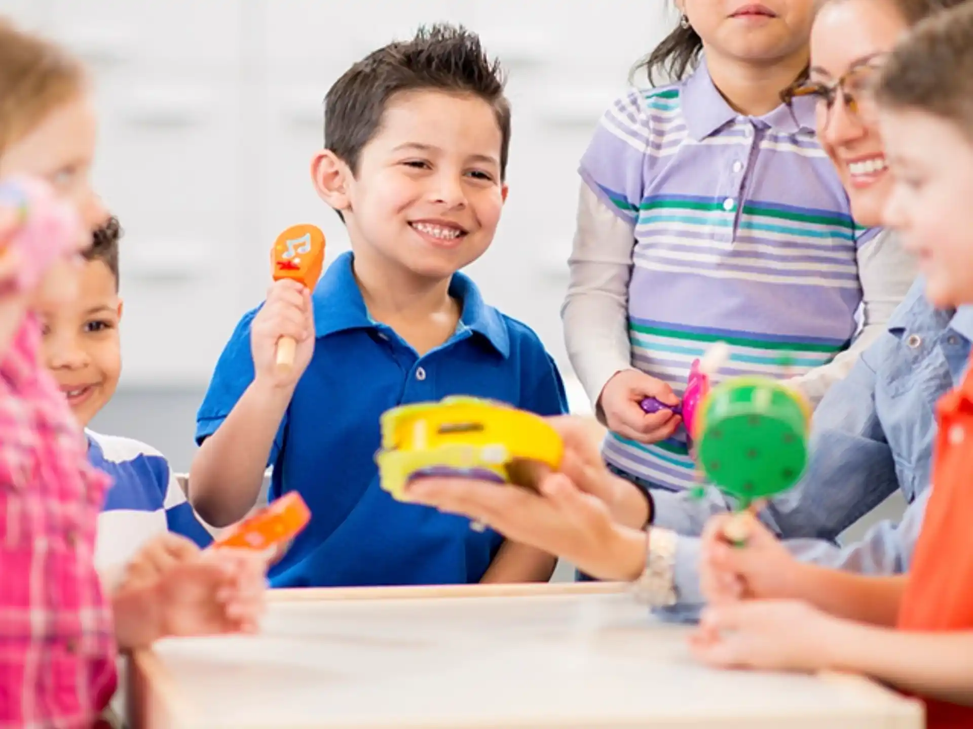 a group of children playing with toys