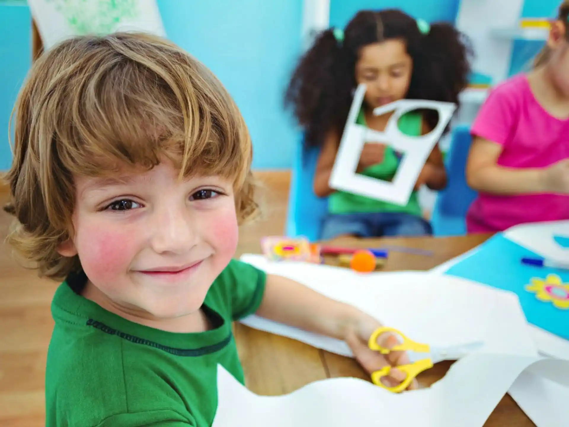 a young boy smiling