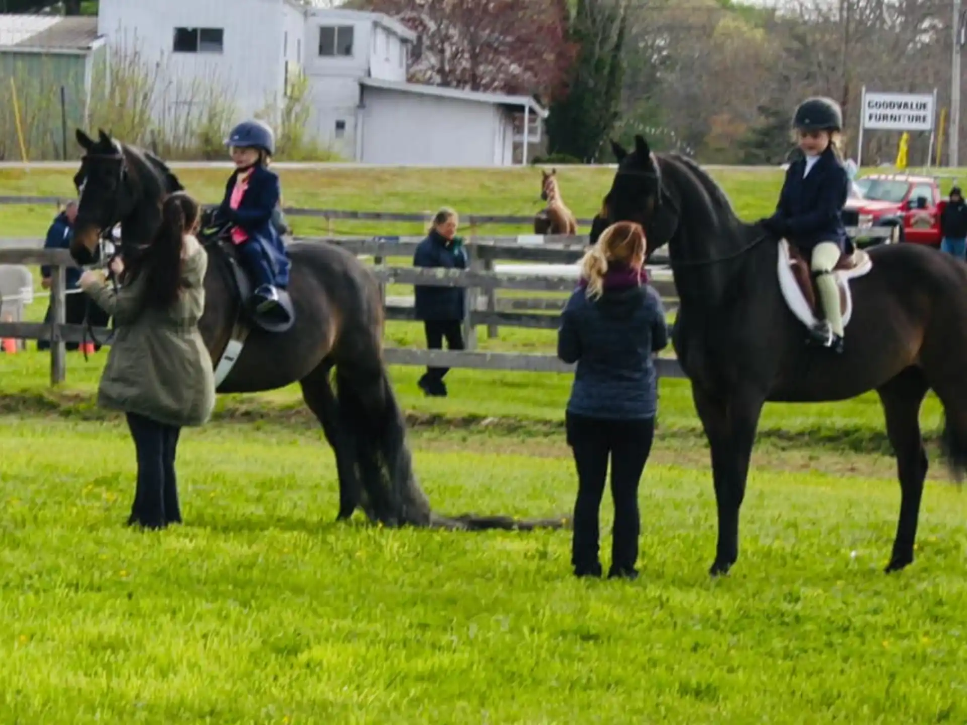 a group of people on horses