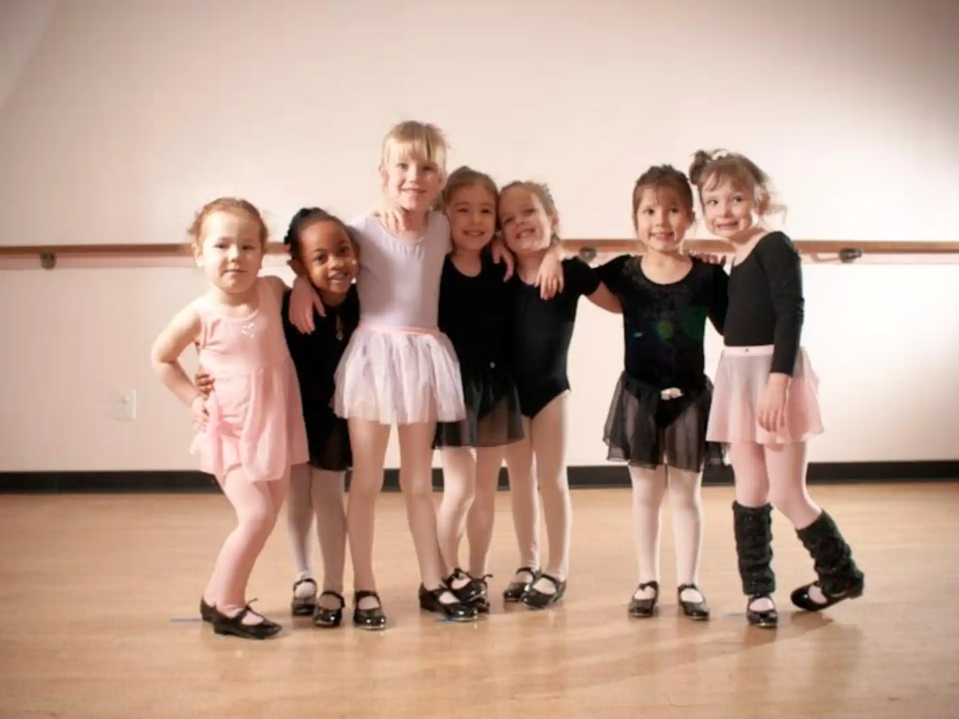 a group of girls posing for a photo