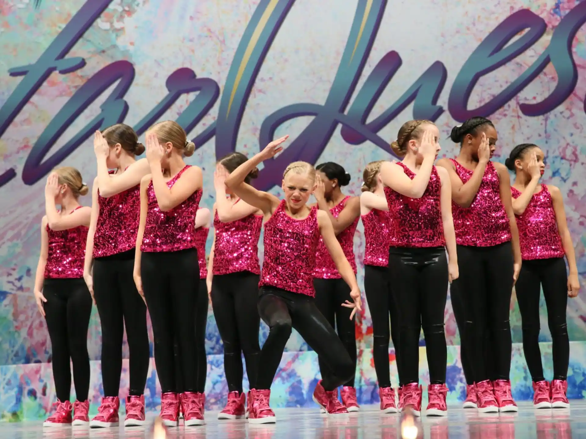 a group of women on a stage