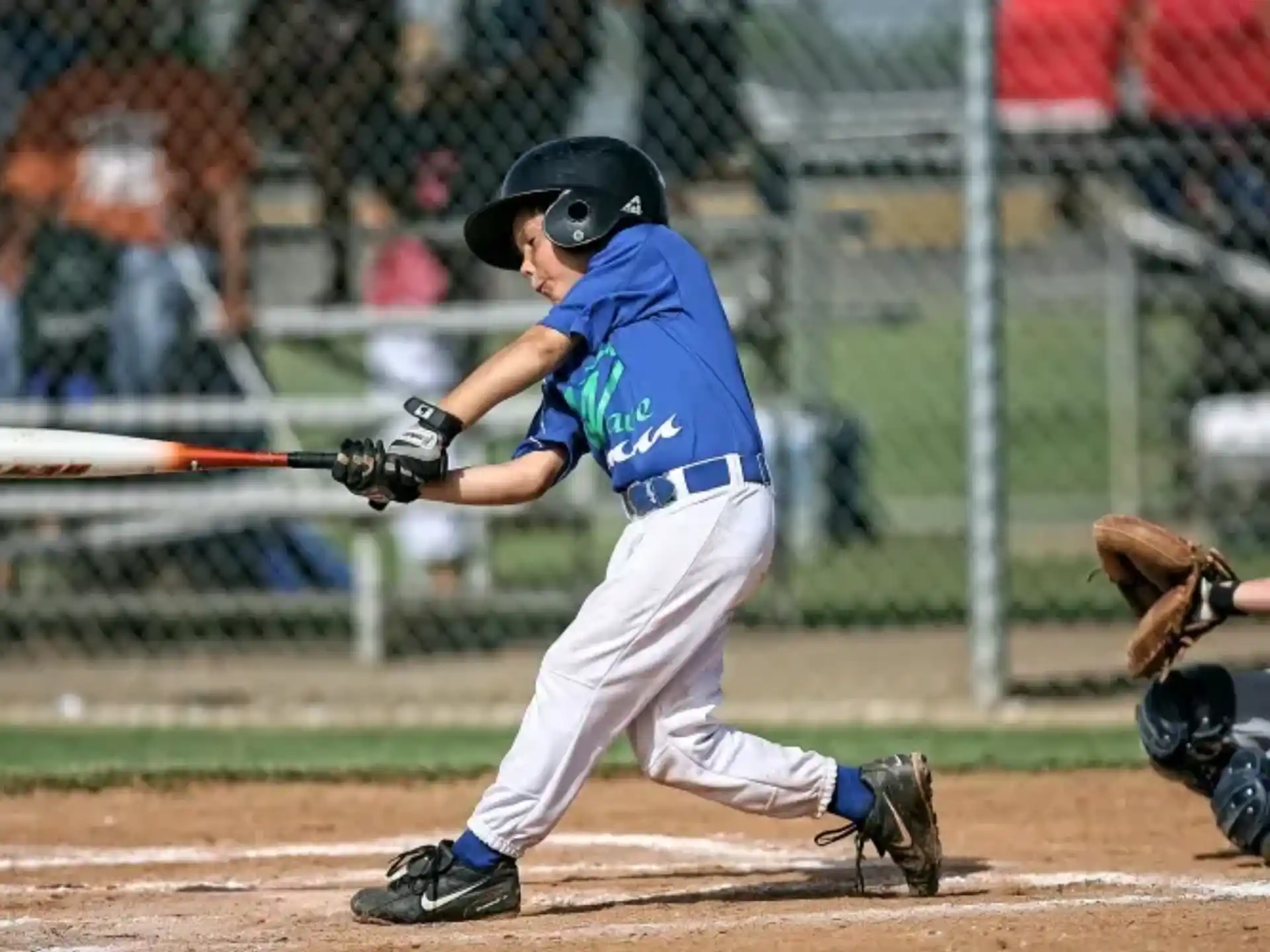 a baseball player swinging a bat