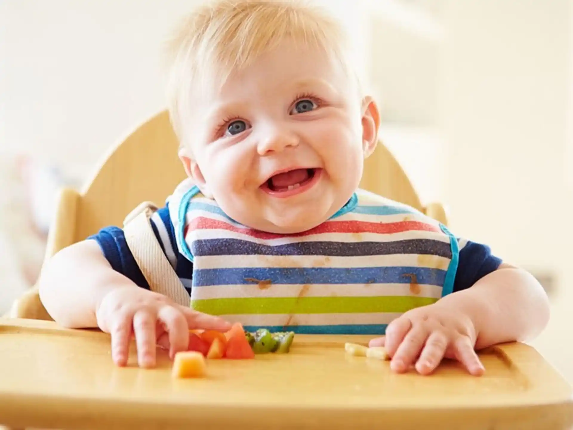 a baby playing with toys