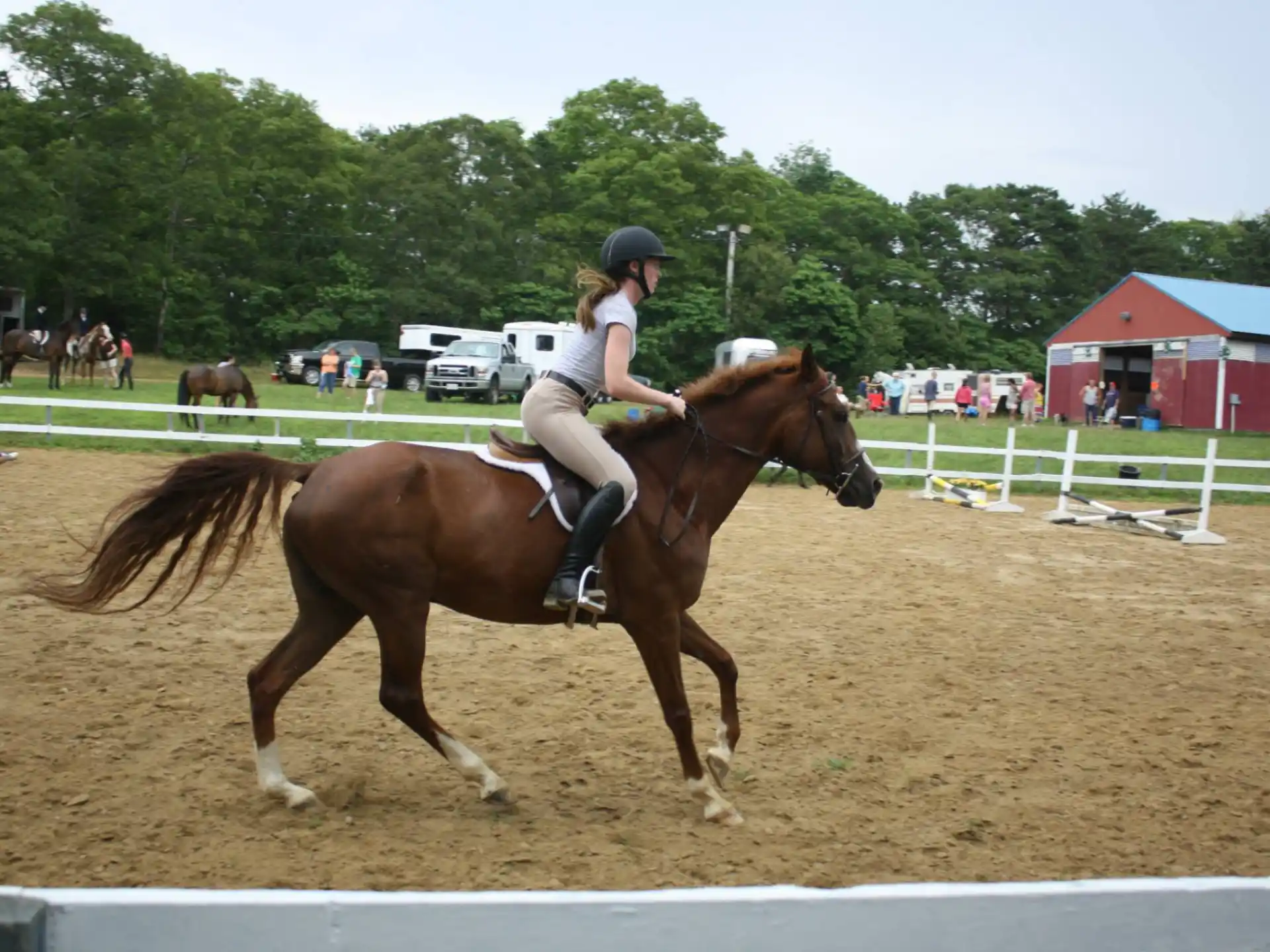 a person riding a horse in a competition