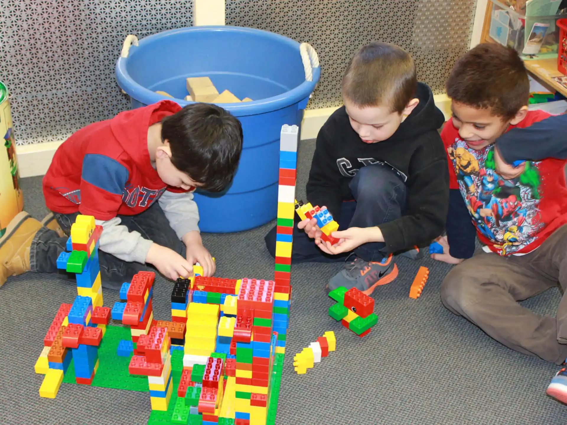 a group of kids playing with toys