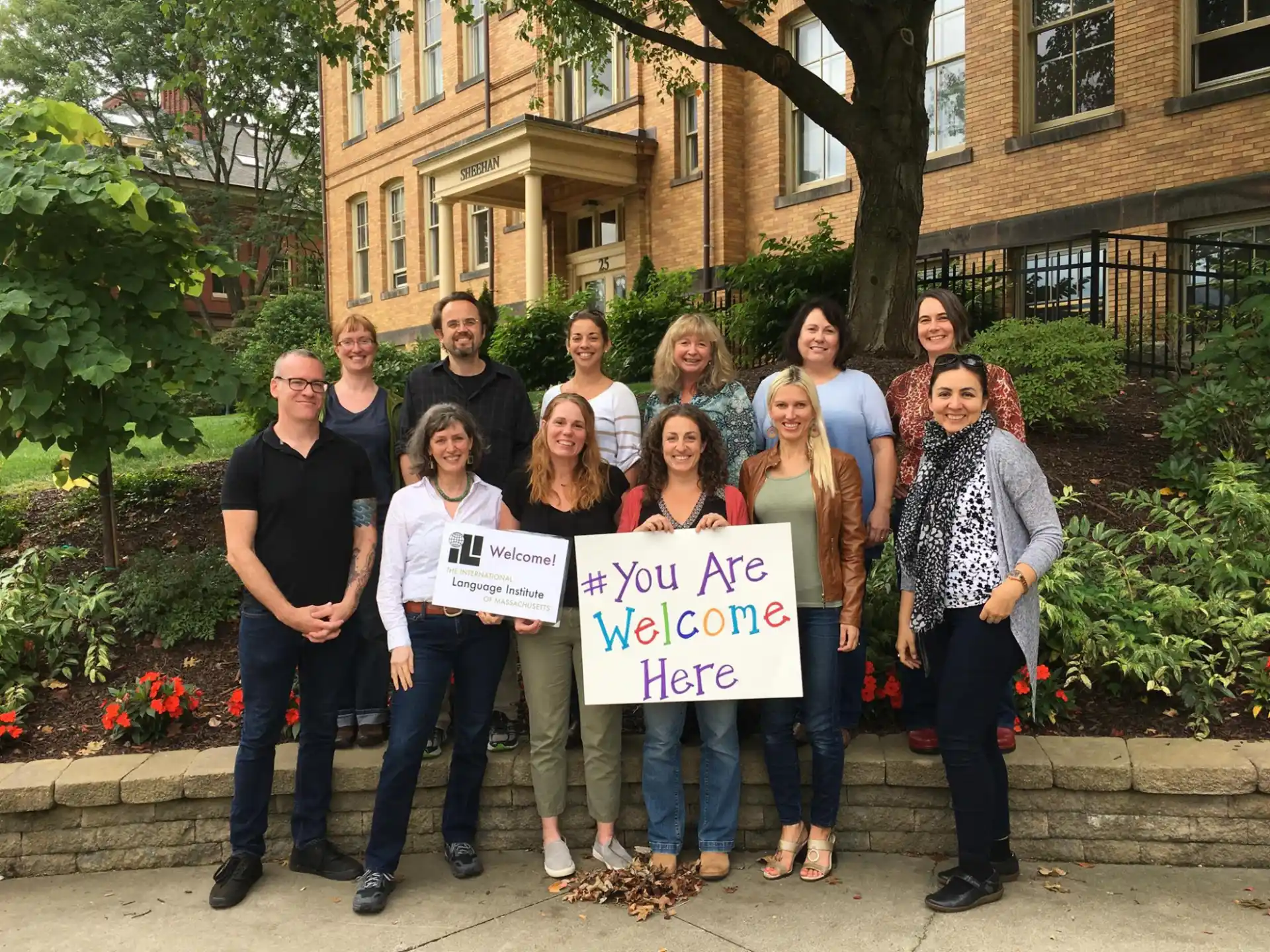 a group of people holding signs