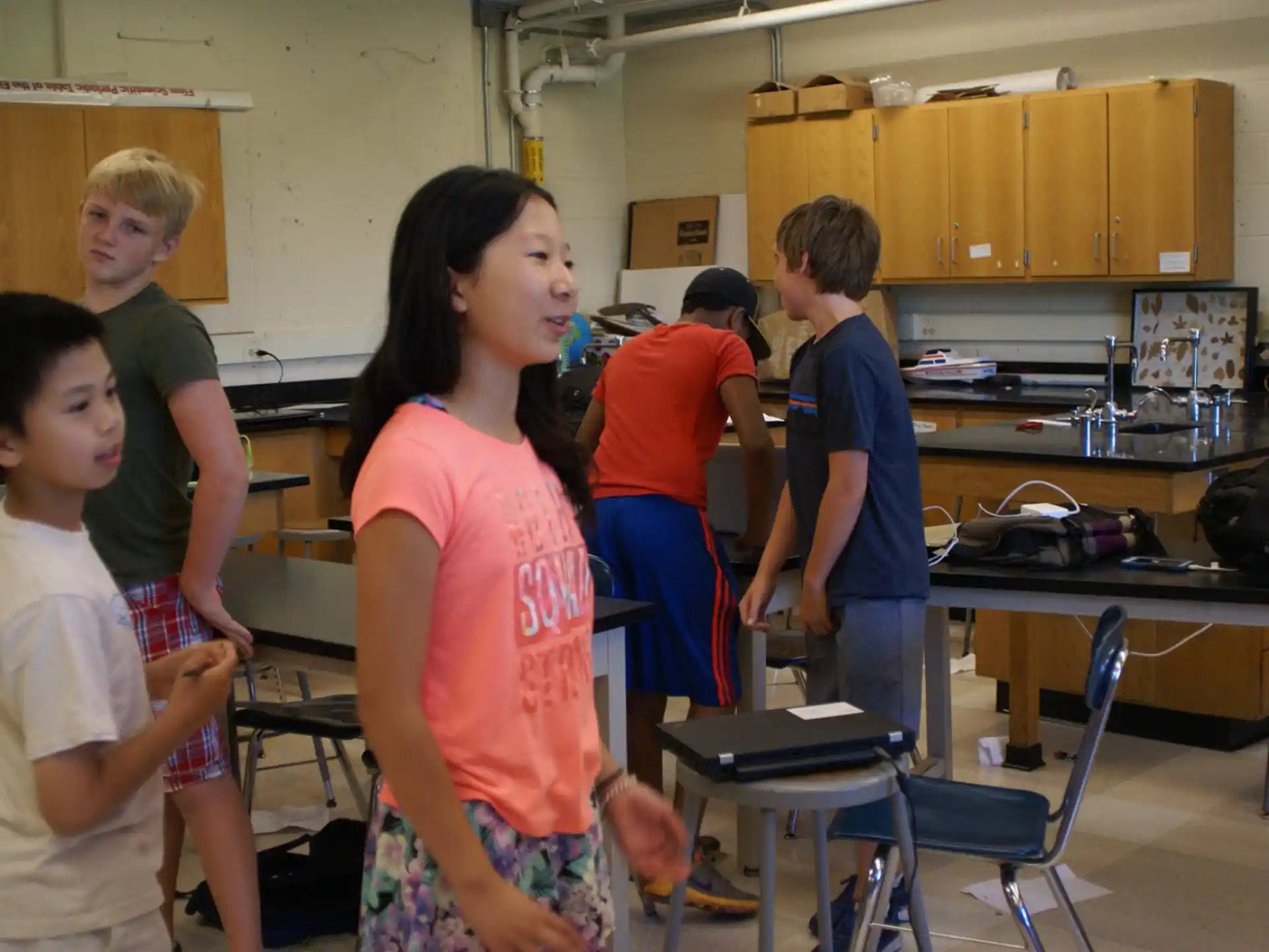 a group of children in a classroom