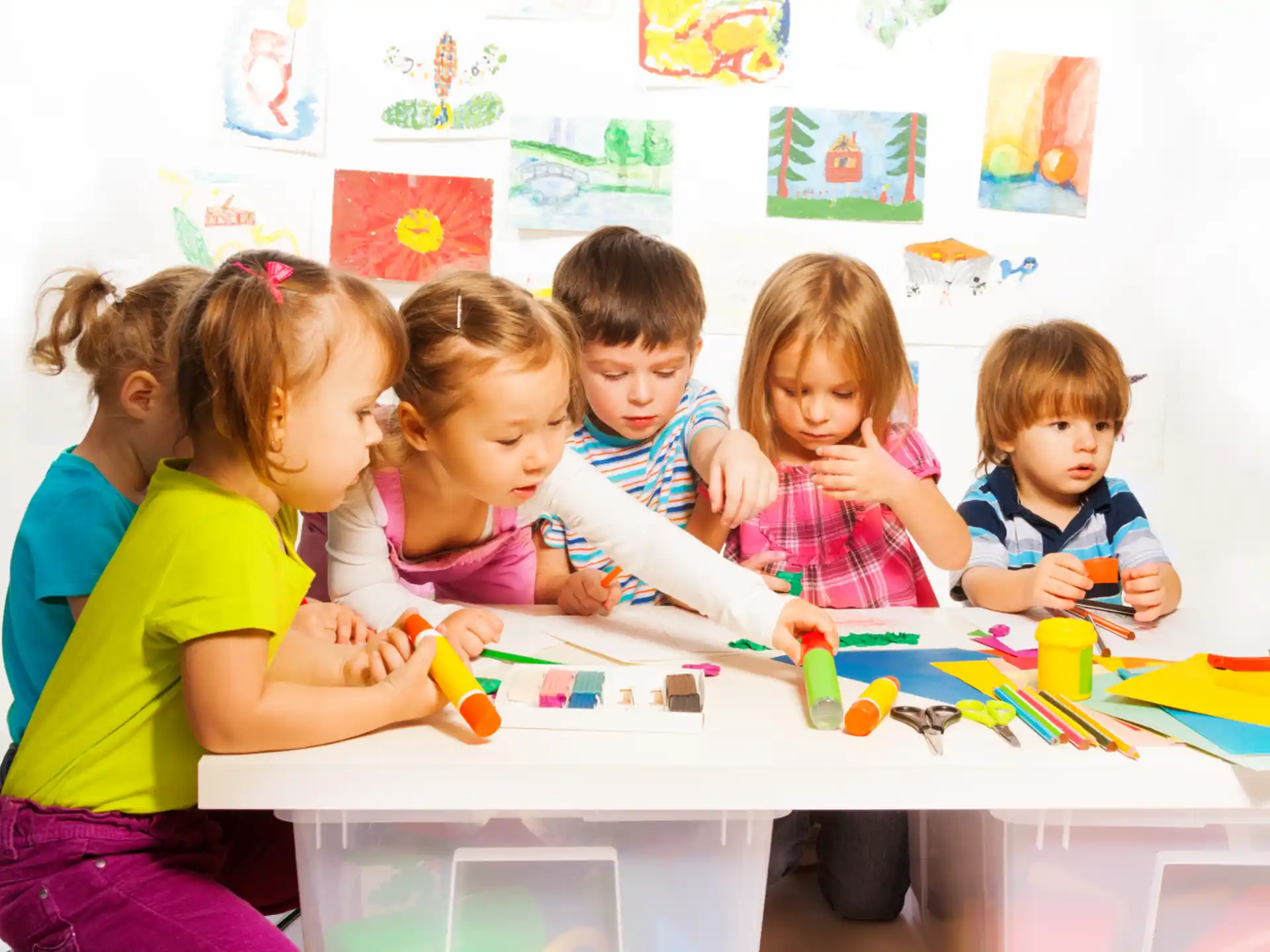 a group of children playing with toys