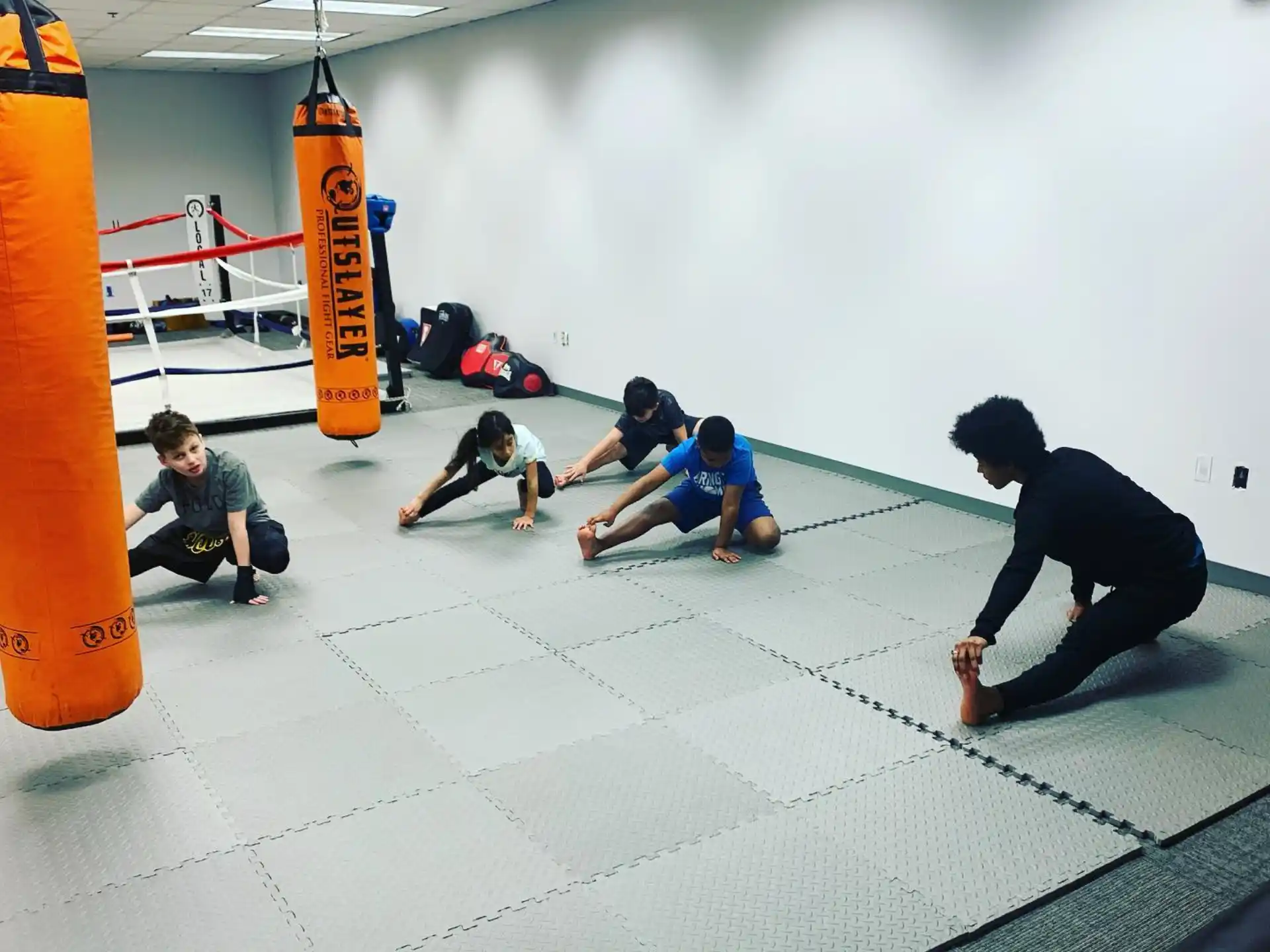 a group of people kneeling on the ground