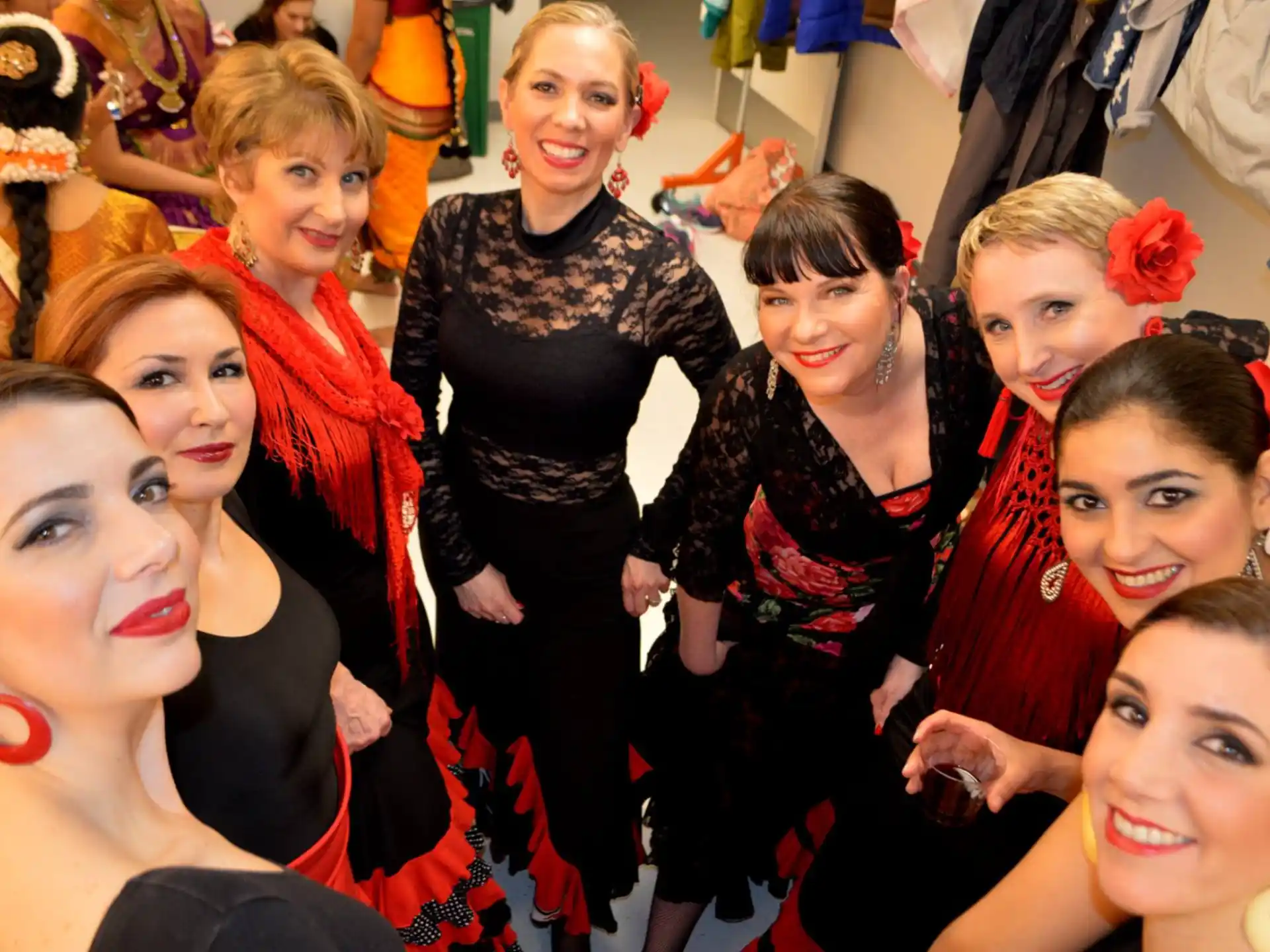a group of women posing for a photo