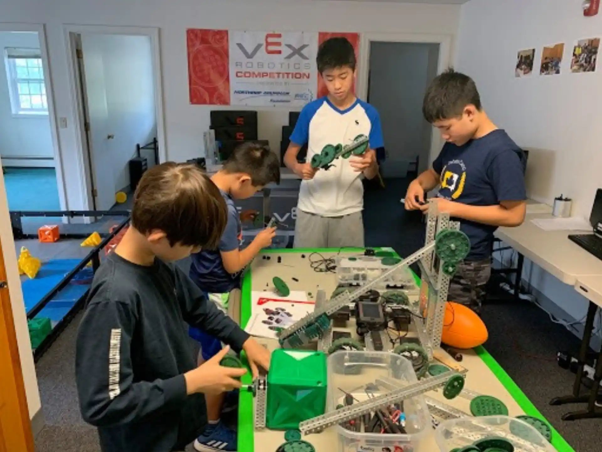a group of boys playing with toys