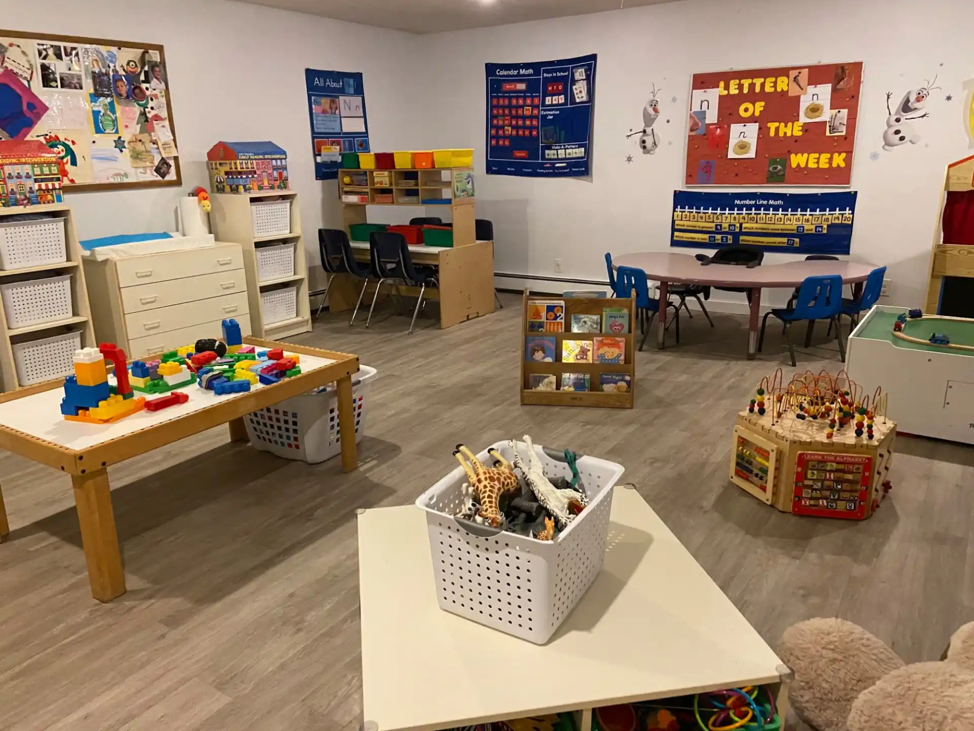 a room with tables and toys