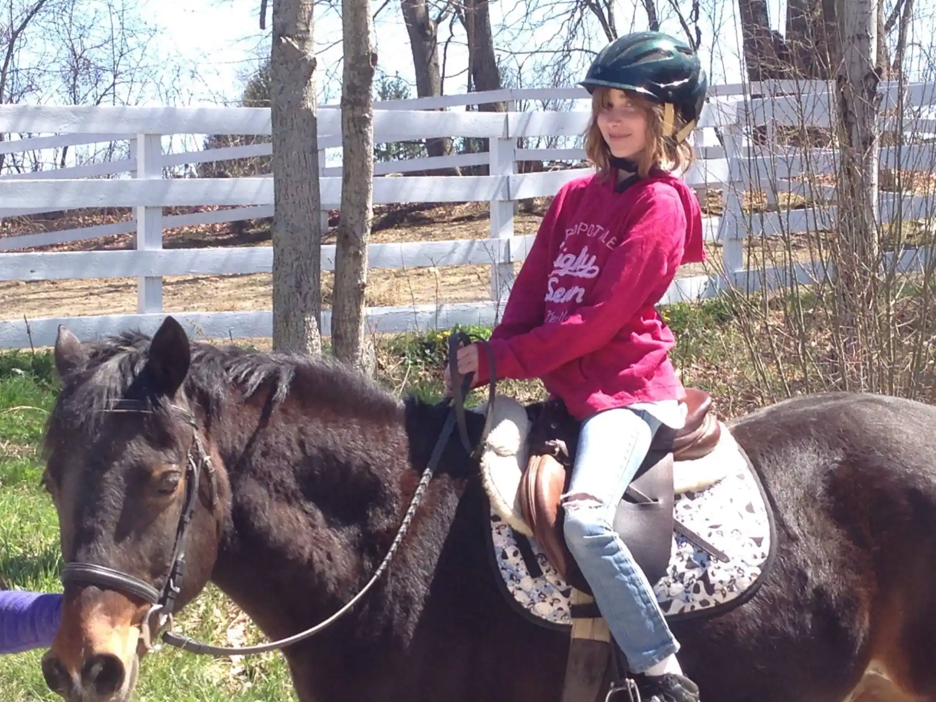 a girl riding a horse