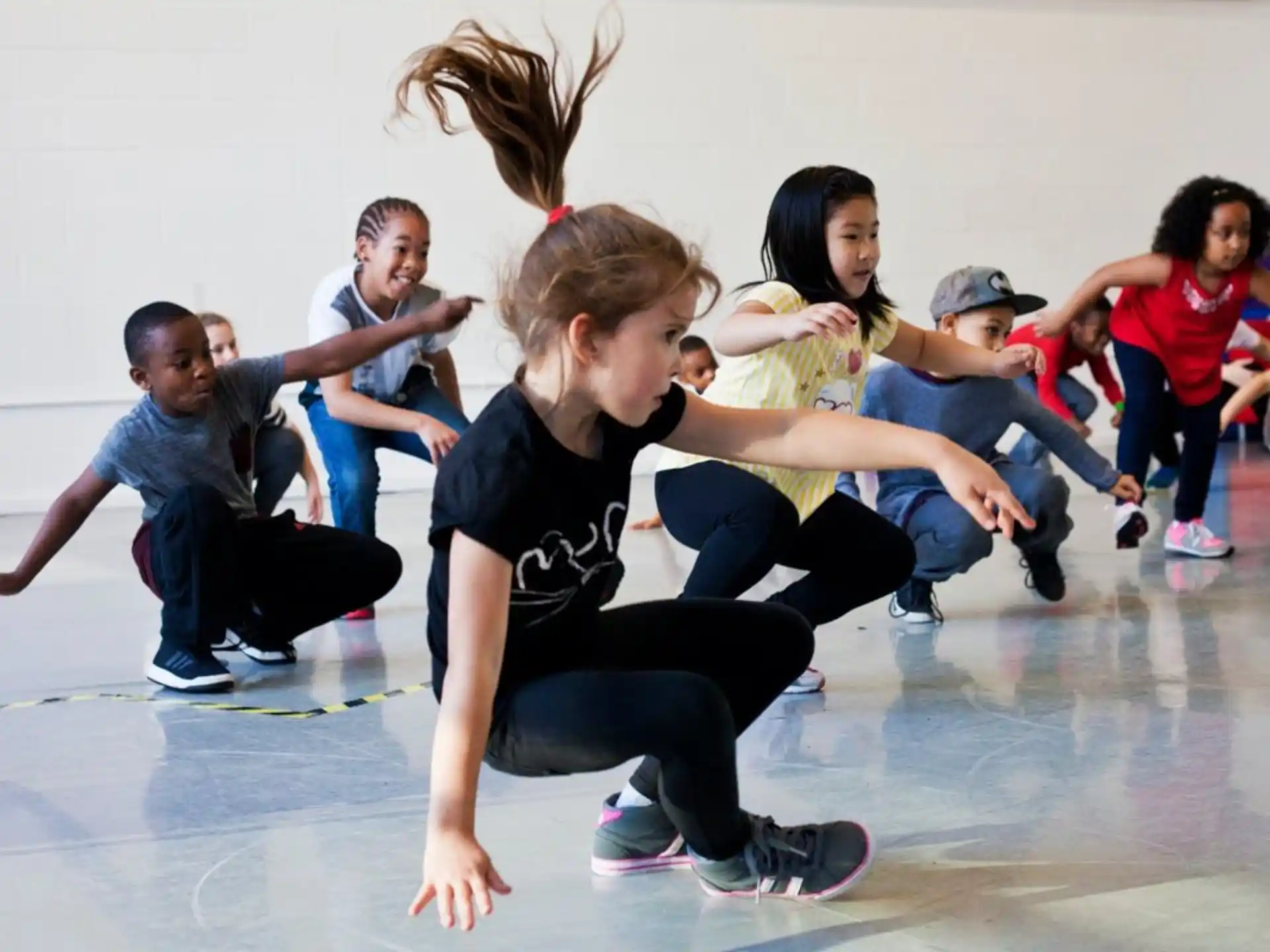 a group of people kneeling on the floor