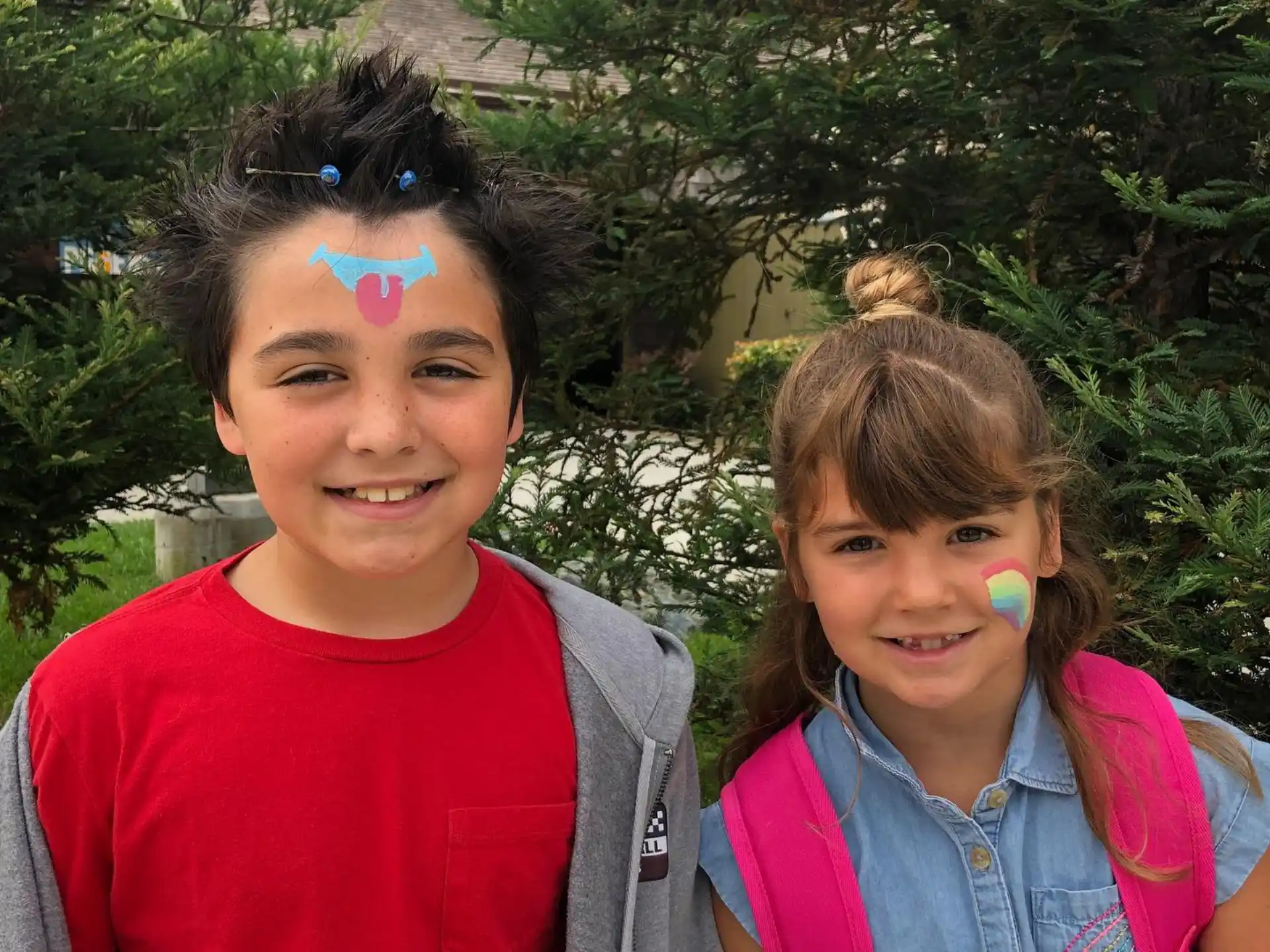 a boy and girl smiling