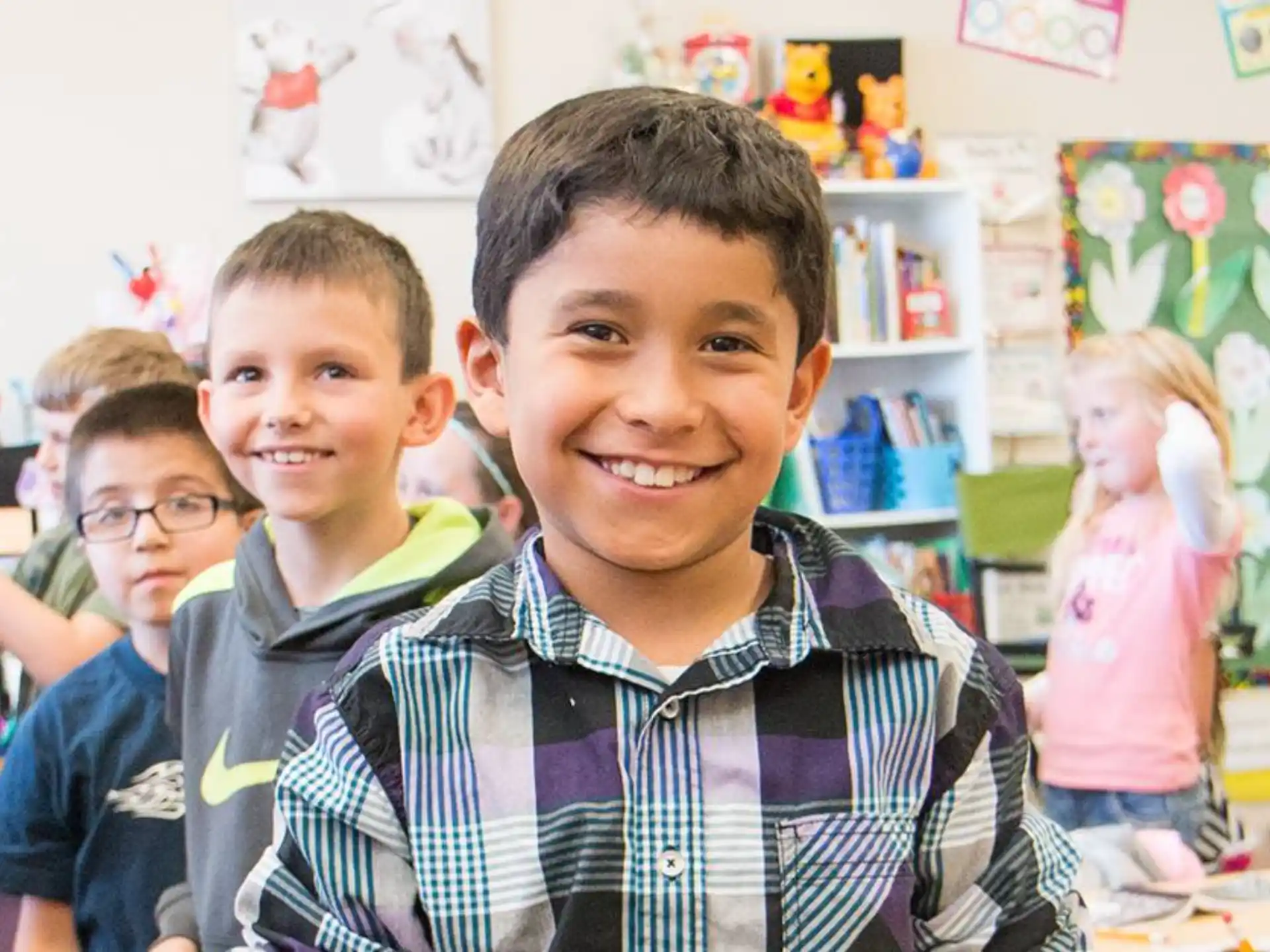 a group of children in a classroom