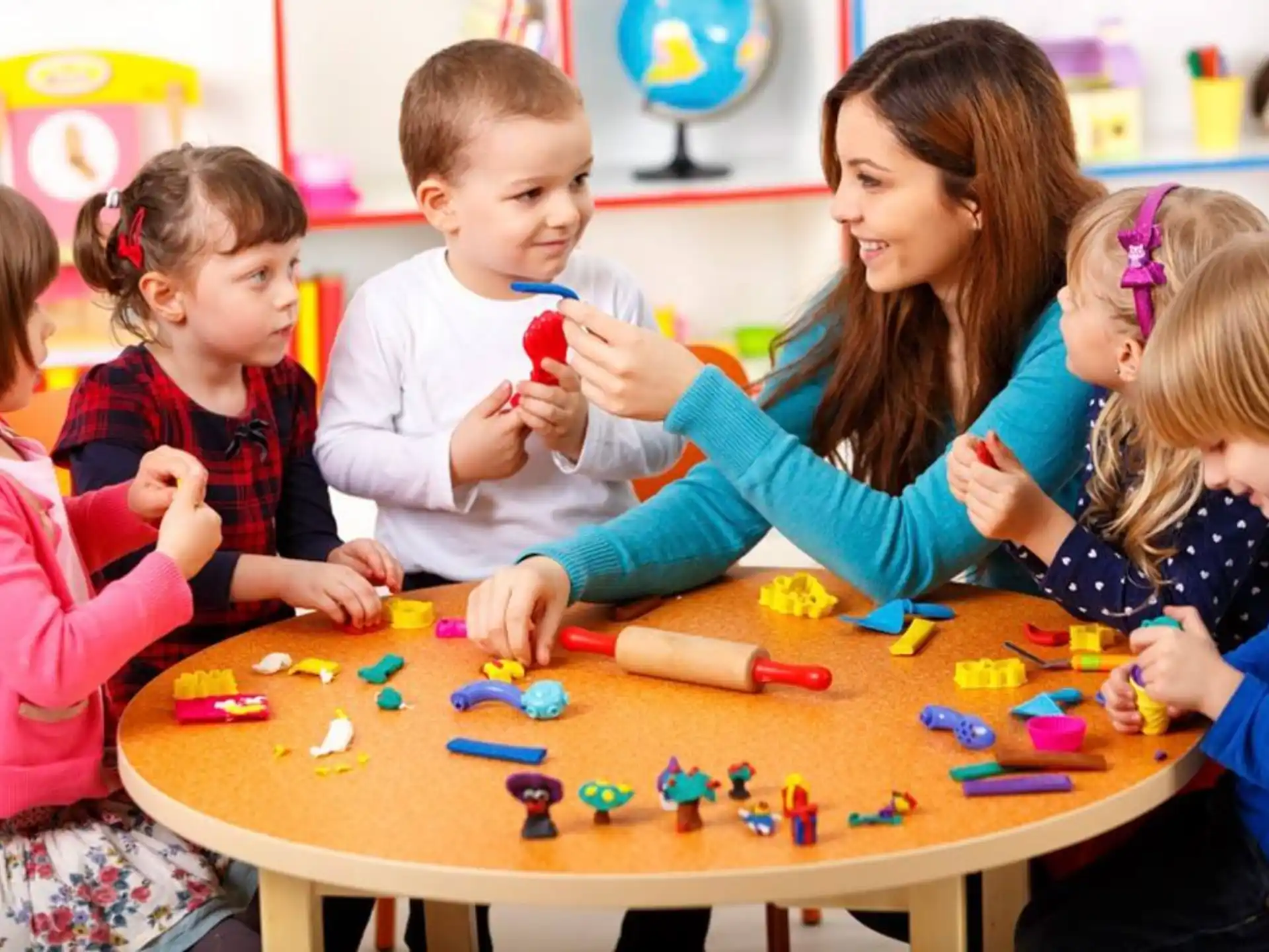 a group of children playing a board game