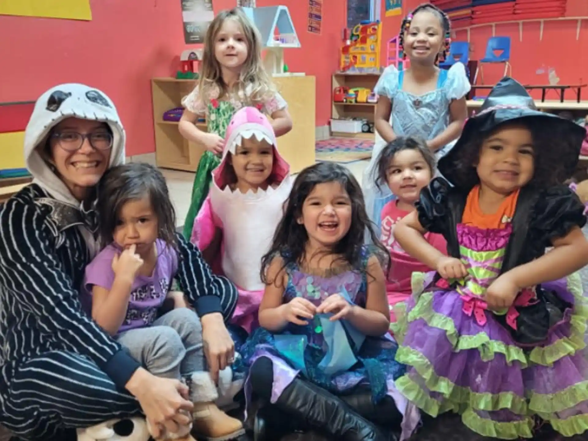 a group of children posing for a photo
