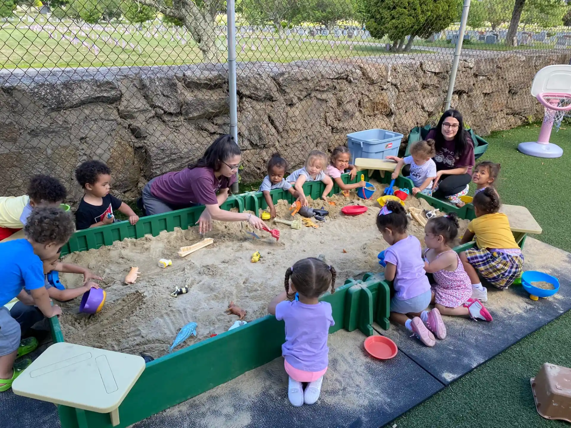 a group of children playing in a yard