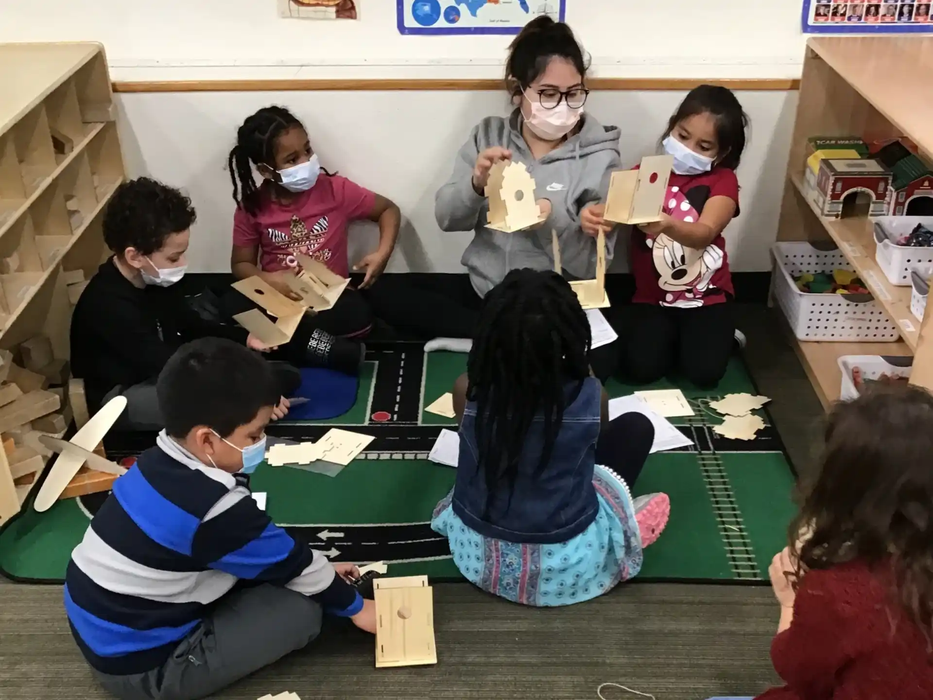 a group of children sitting on the floor