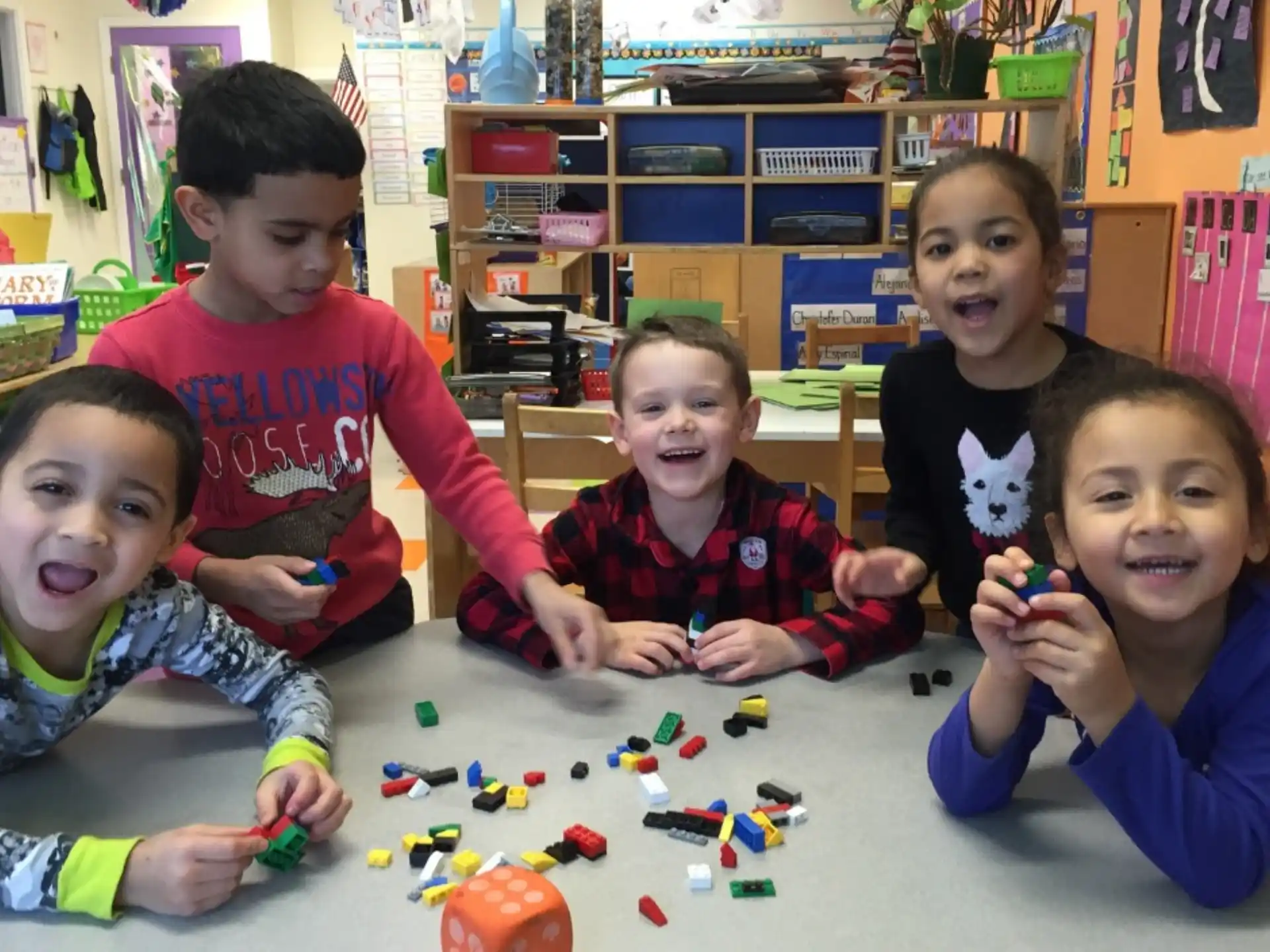 a group of kids playing with toys