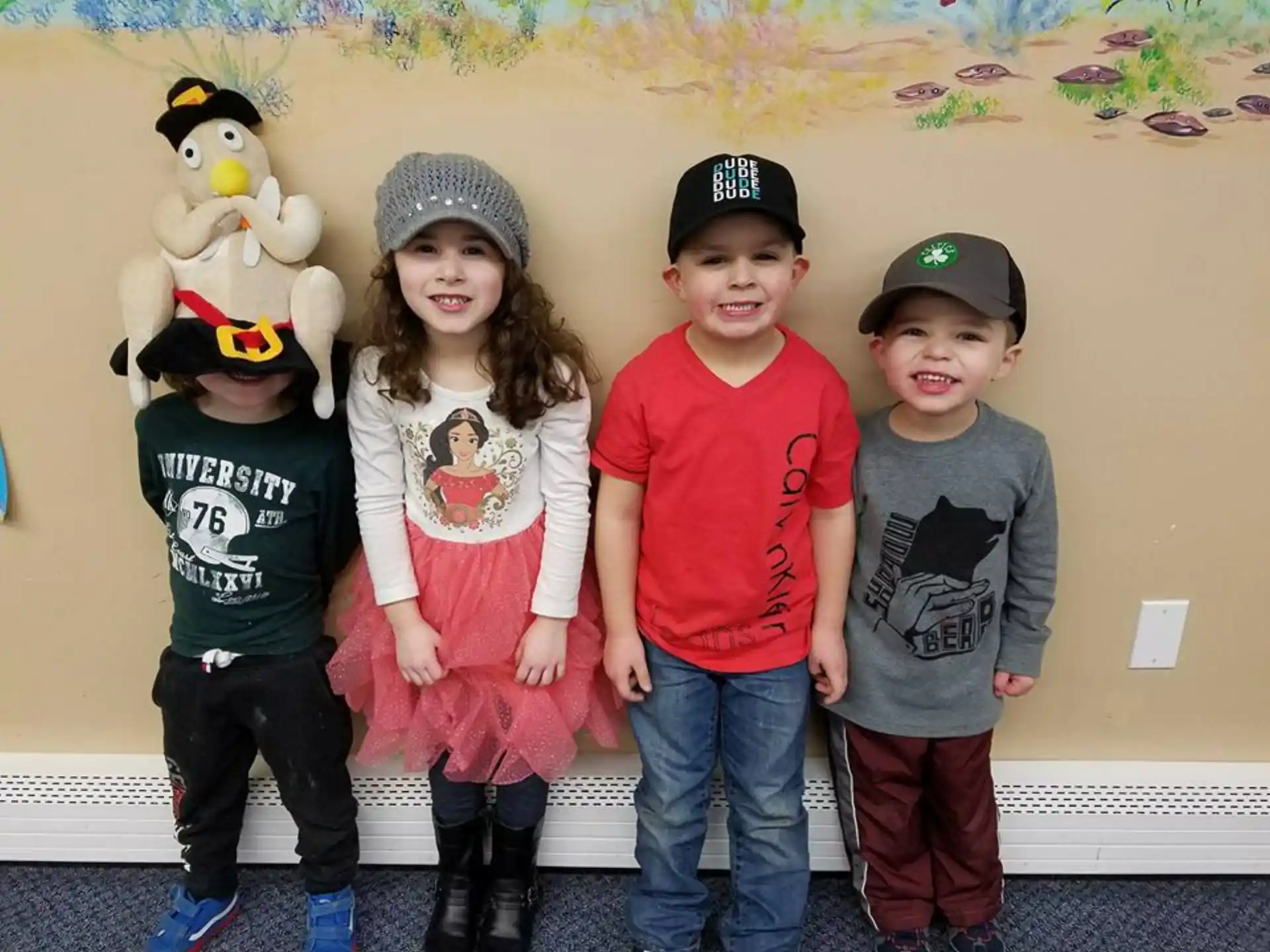 a group of children posing for a photo